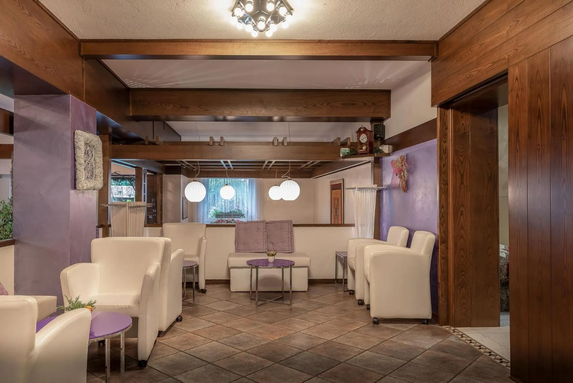 Communal lounge/ TV room in Hotel Latemar