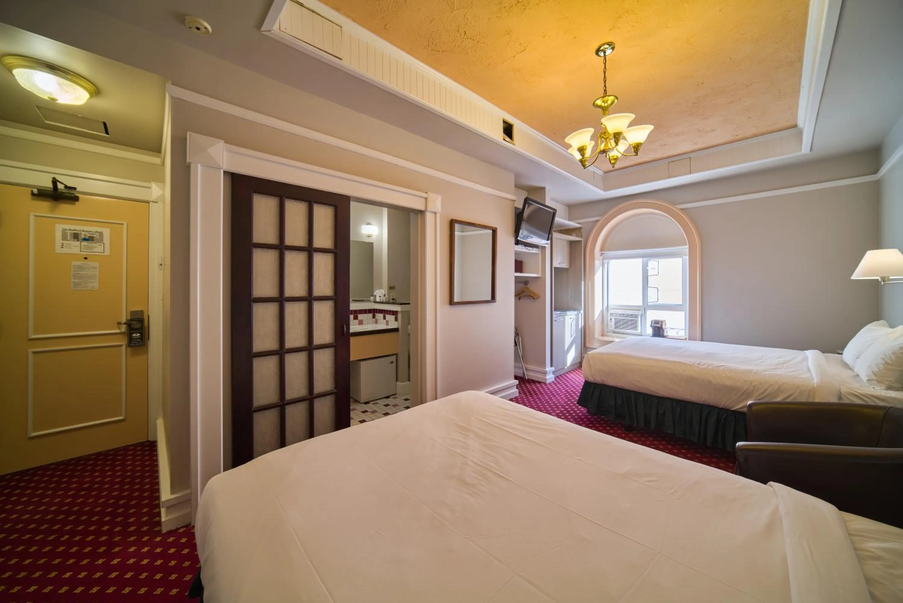 Bed in The Bedford Regency Hotel