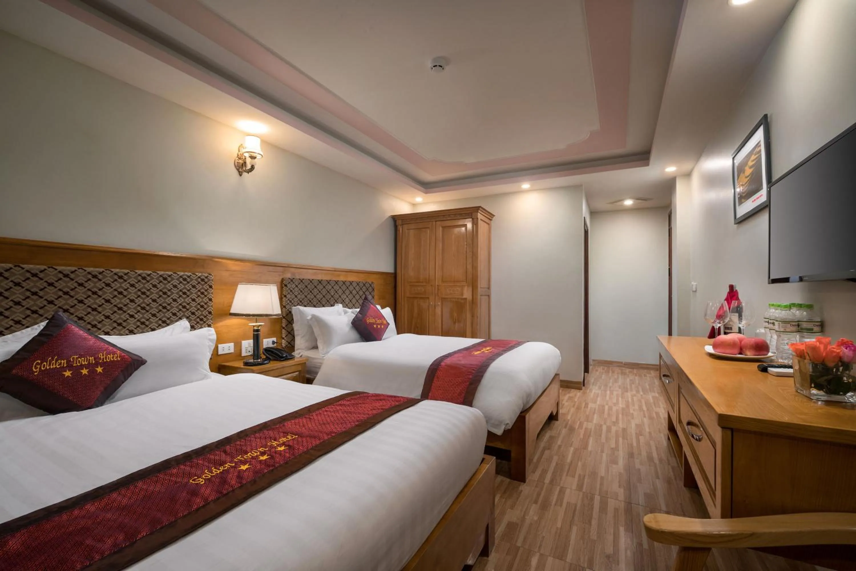 Bed in Golden Town Hotel