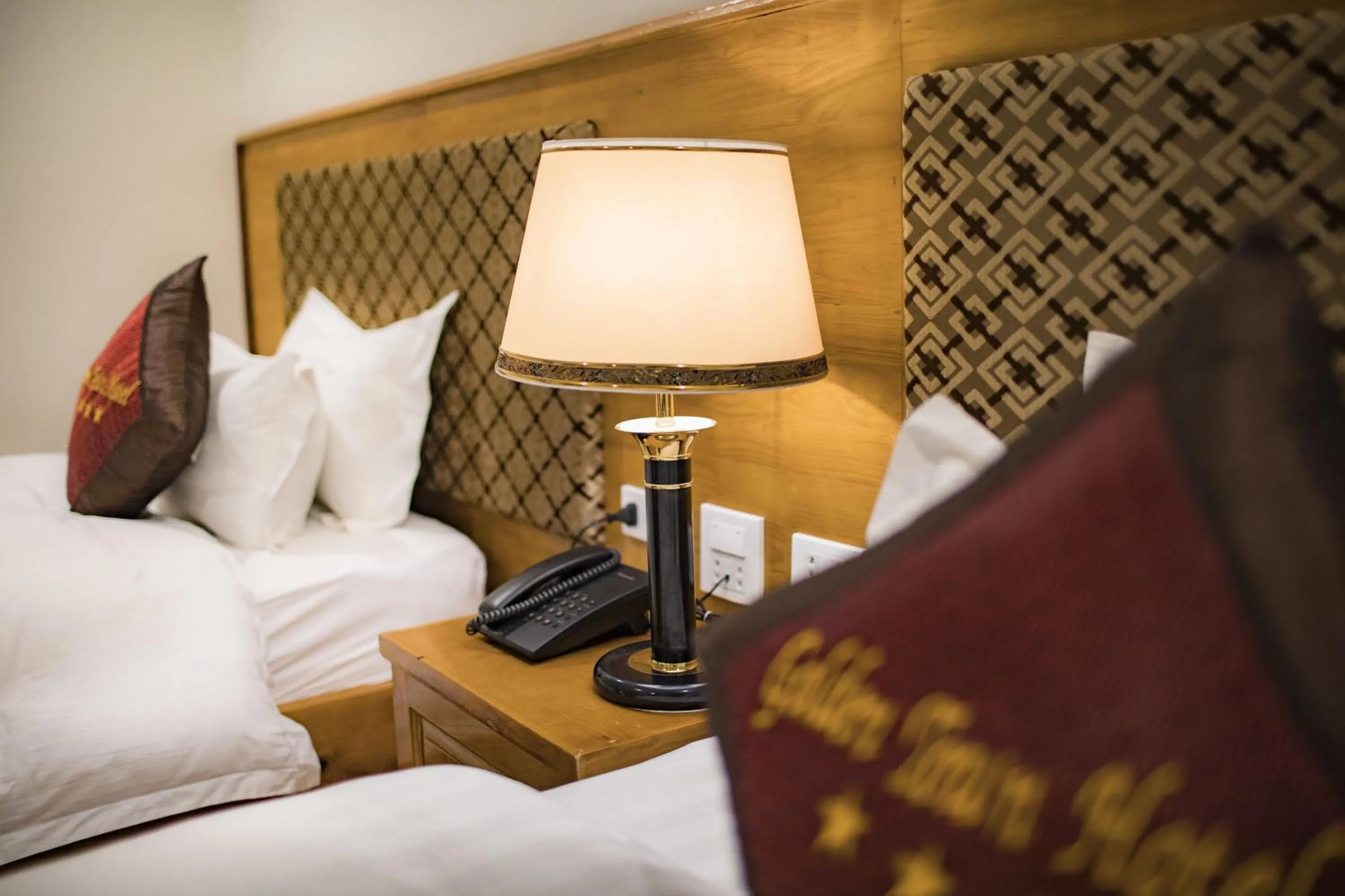 Bed in Golden Town Hotel