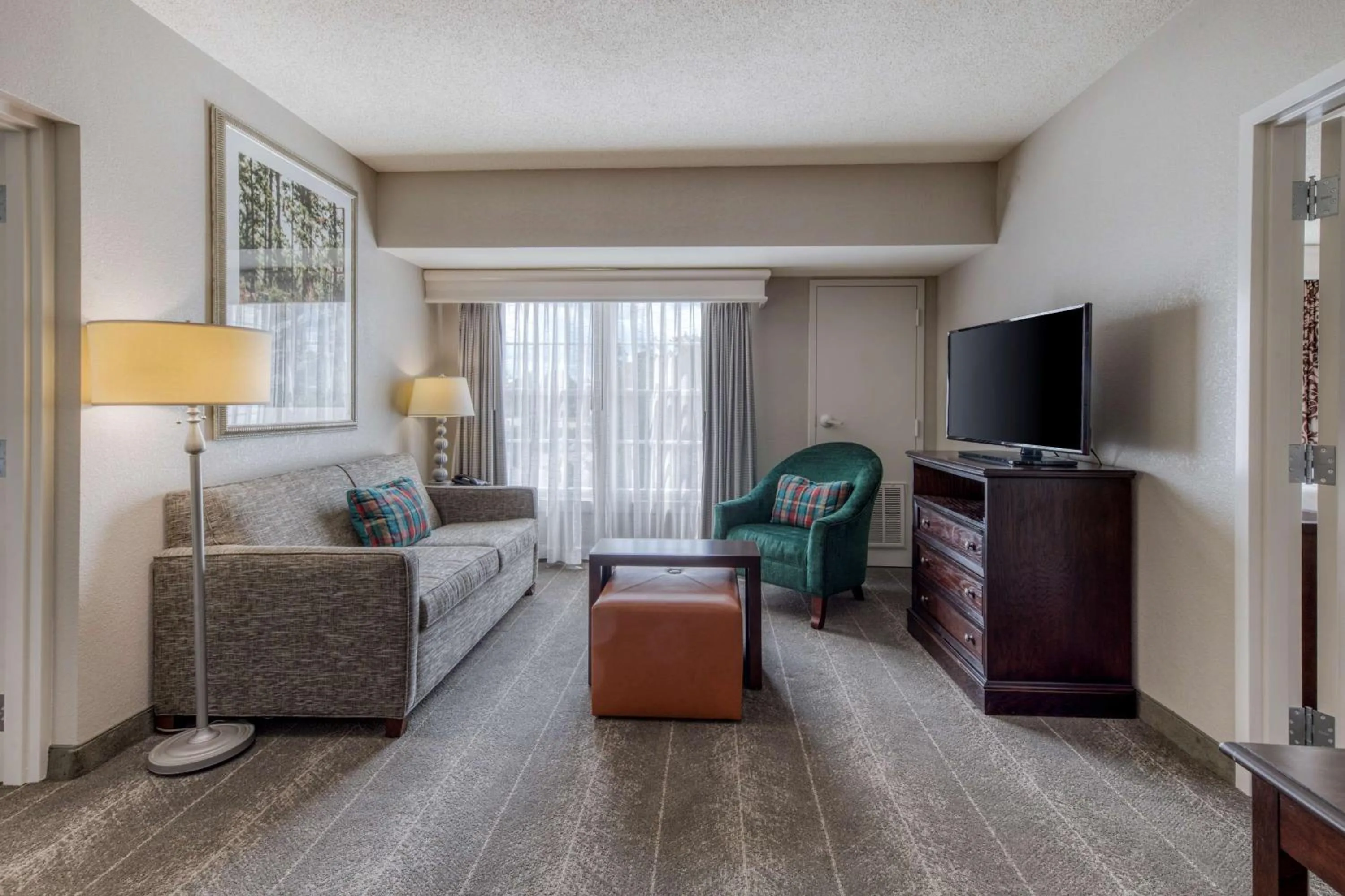Living room, Bed in Homewood Suites by Hilton Olmsted Village