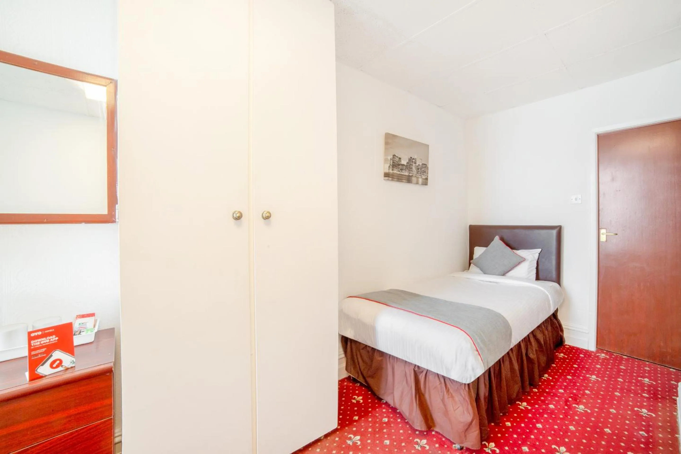 Bedroom in OYO The Golden Cheval Hotel