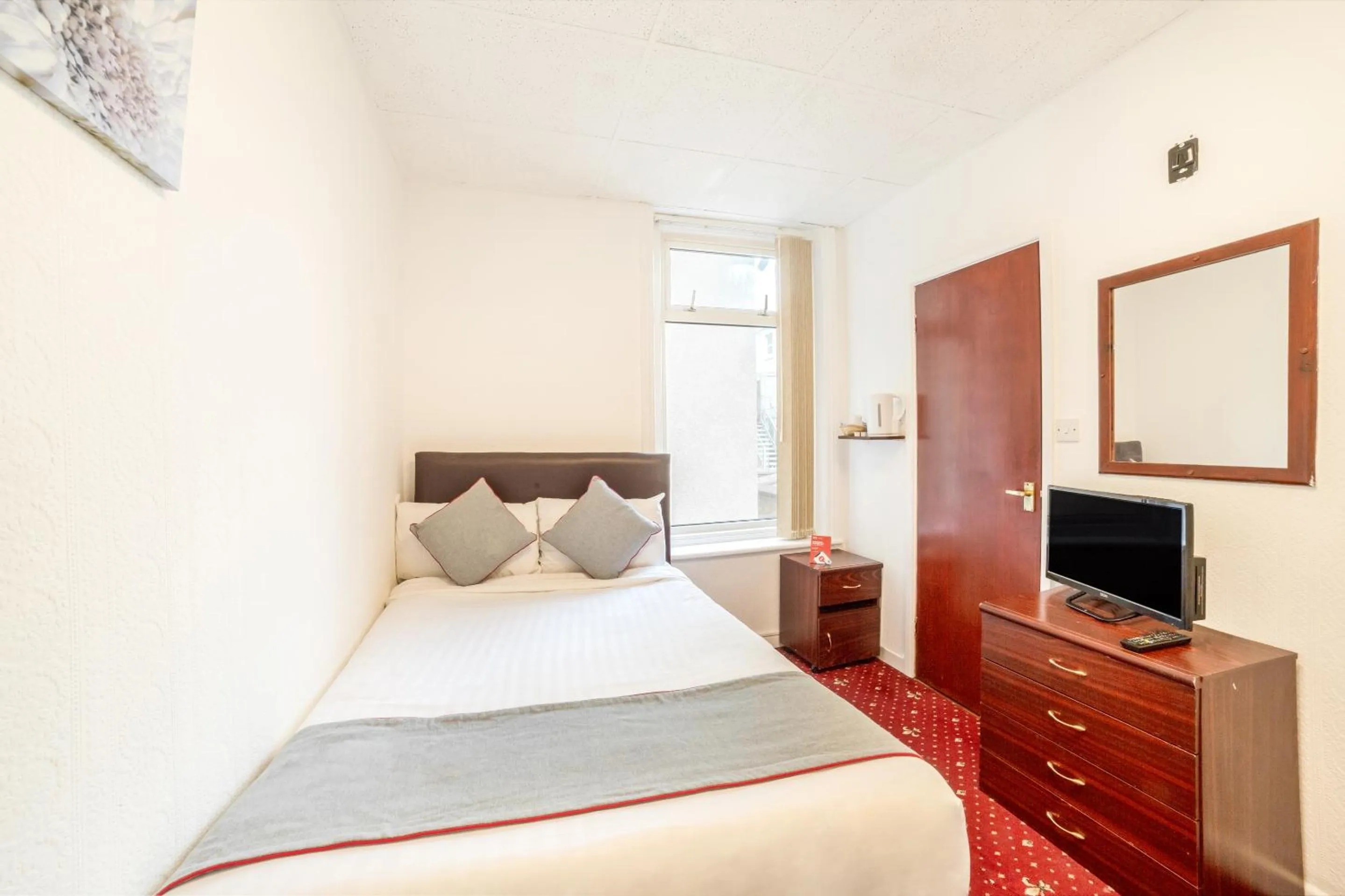 Bedroom in OYO The Golden Cheval Hotel