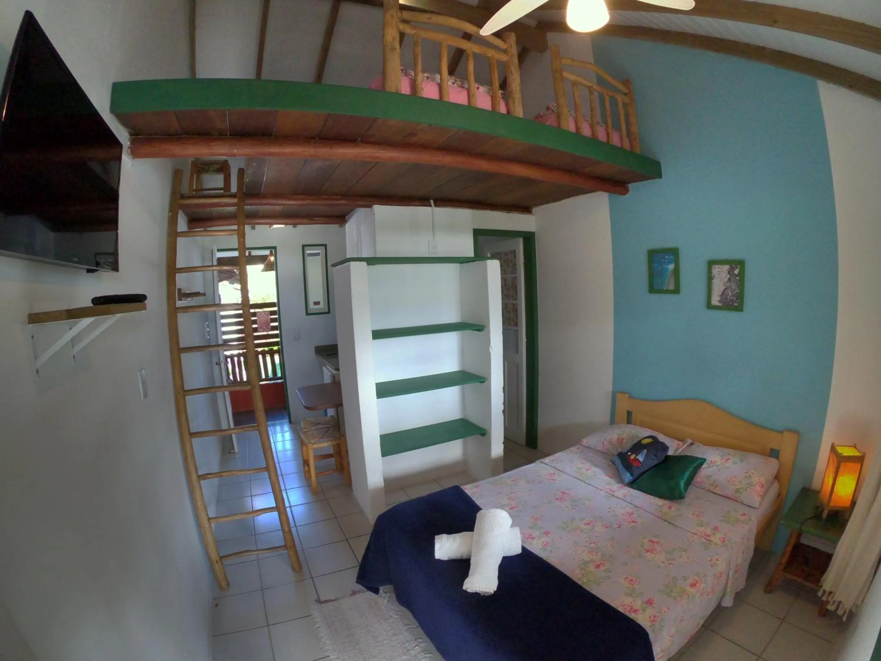 Bed in Pousada Canoa Azul na Praia da Ferrugem