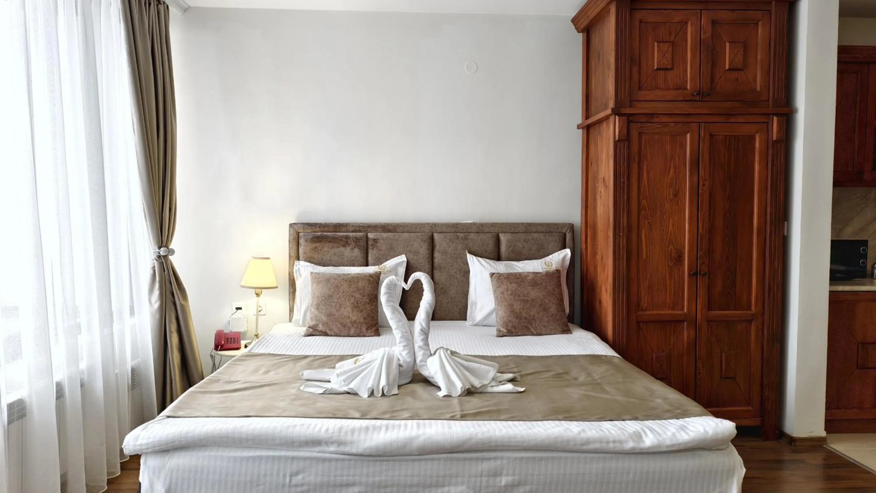 Bed in Elegant Lux Hotel