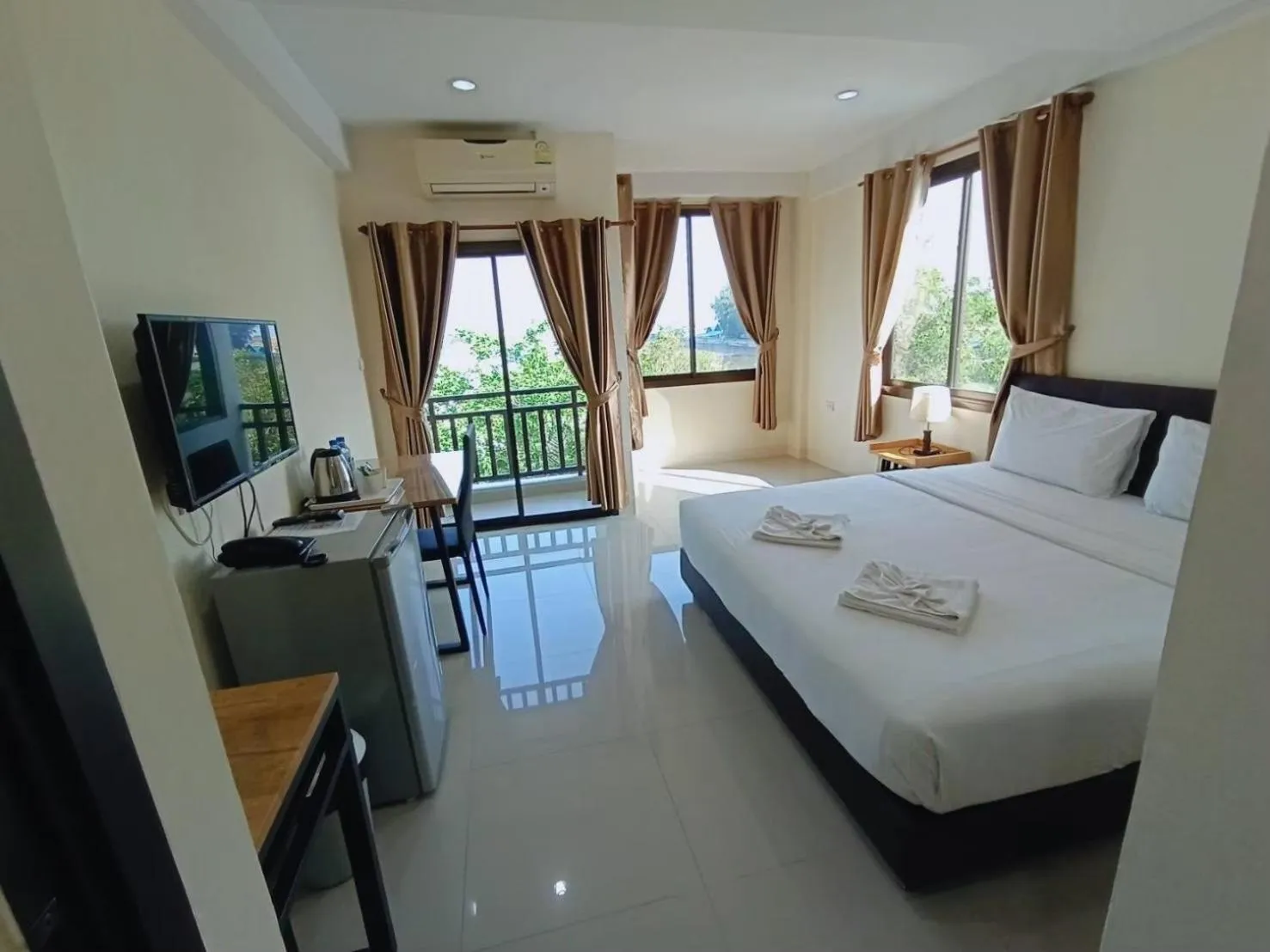 Bed in Sasi Nonthaburi Hotel