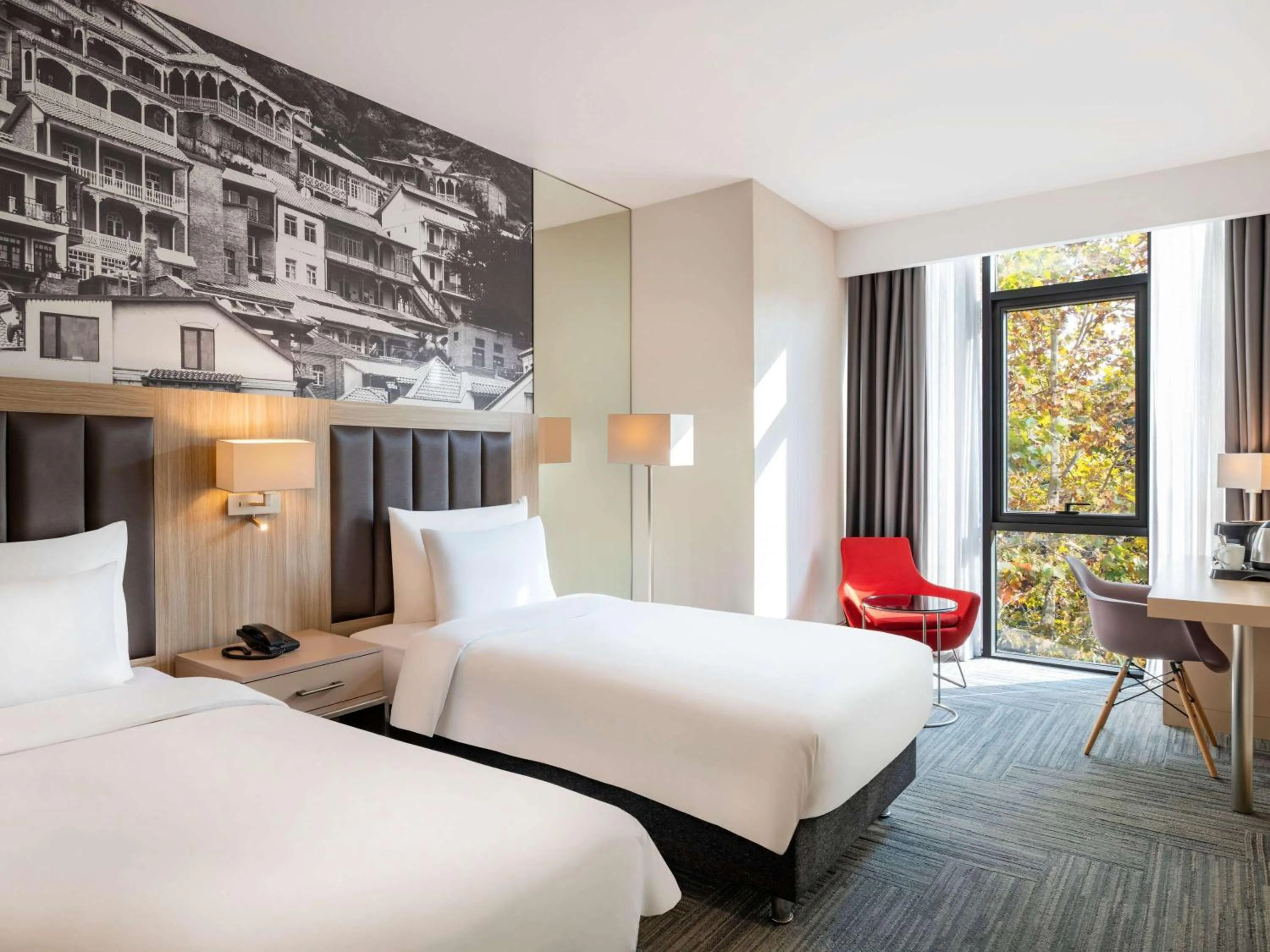 Bed in Ramada Encore Tbilisi