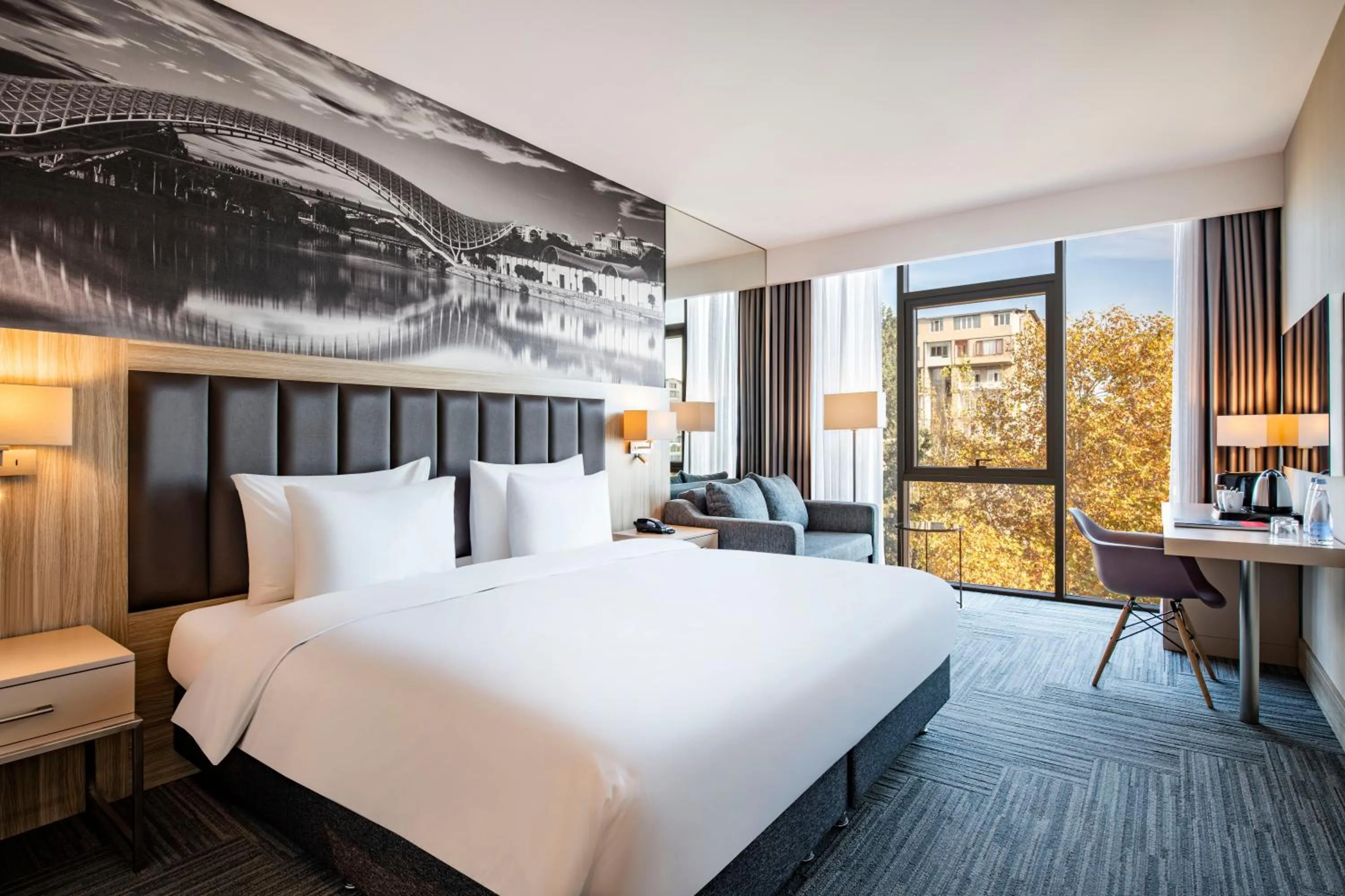 Bed in Ramada Encore Tbilisi