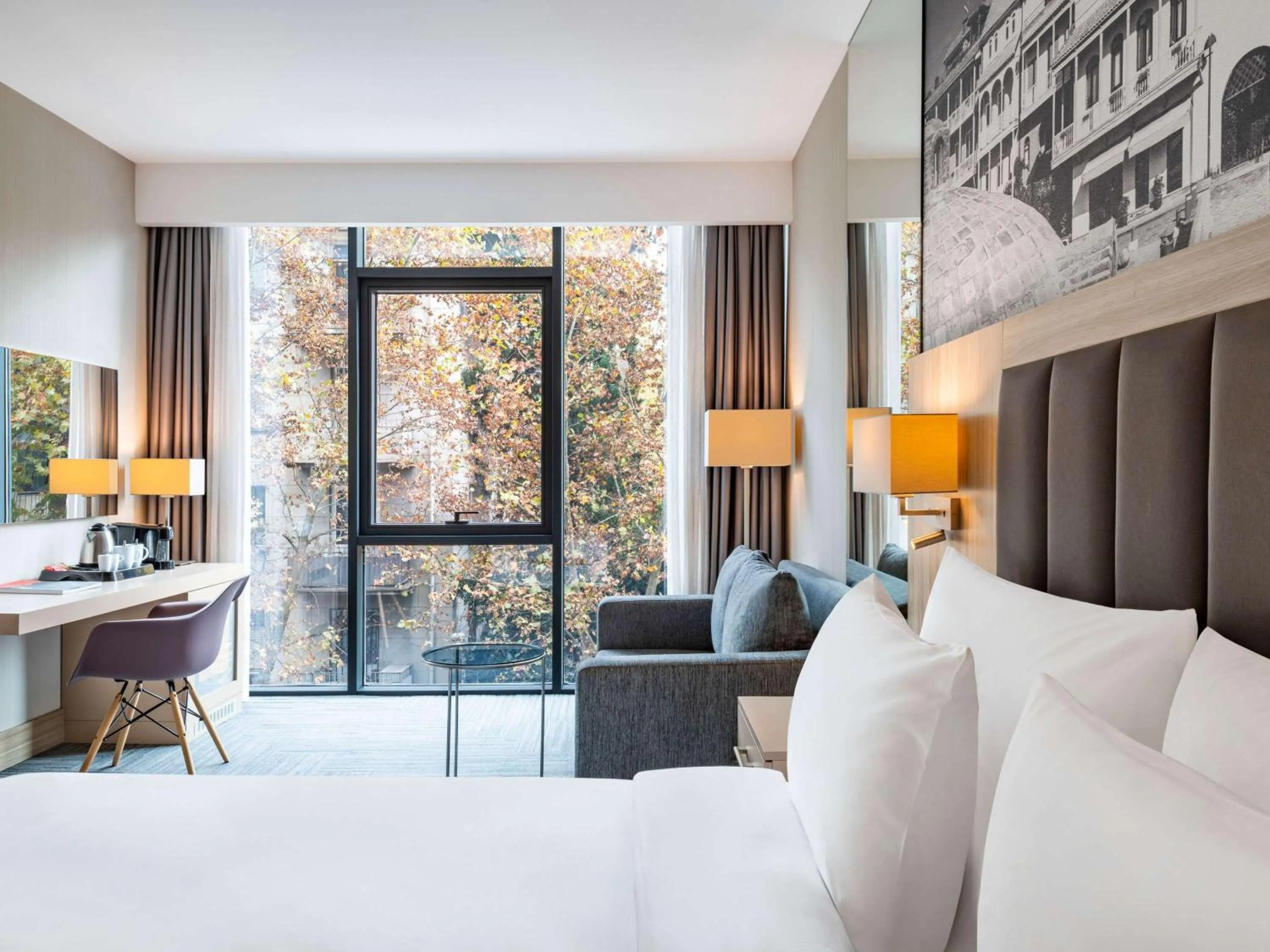 Bed in Ramada Encore Tbilisi