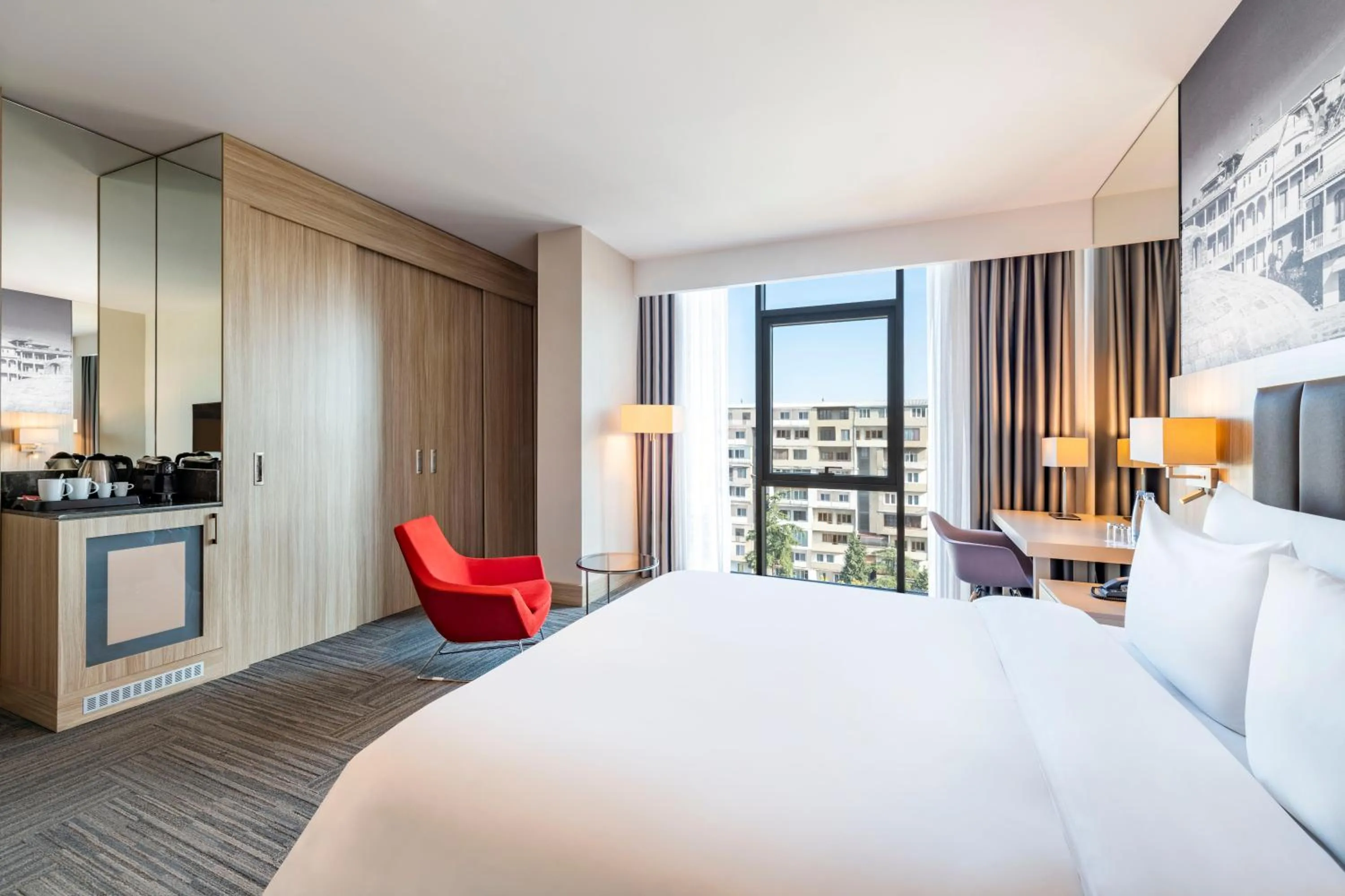 Bed in Ramada Encore Tbilisi