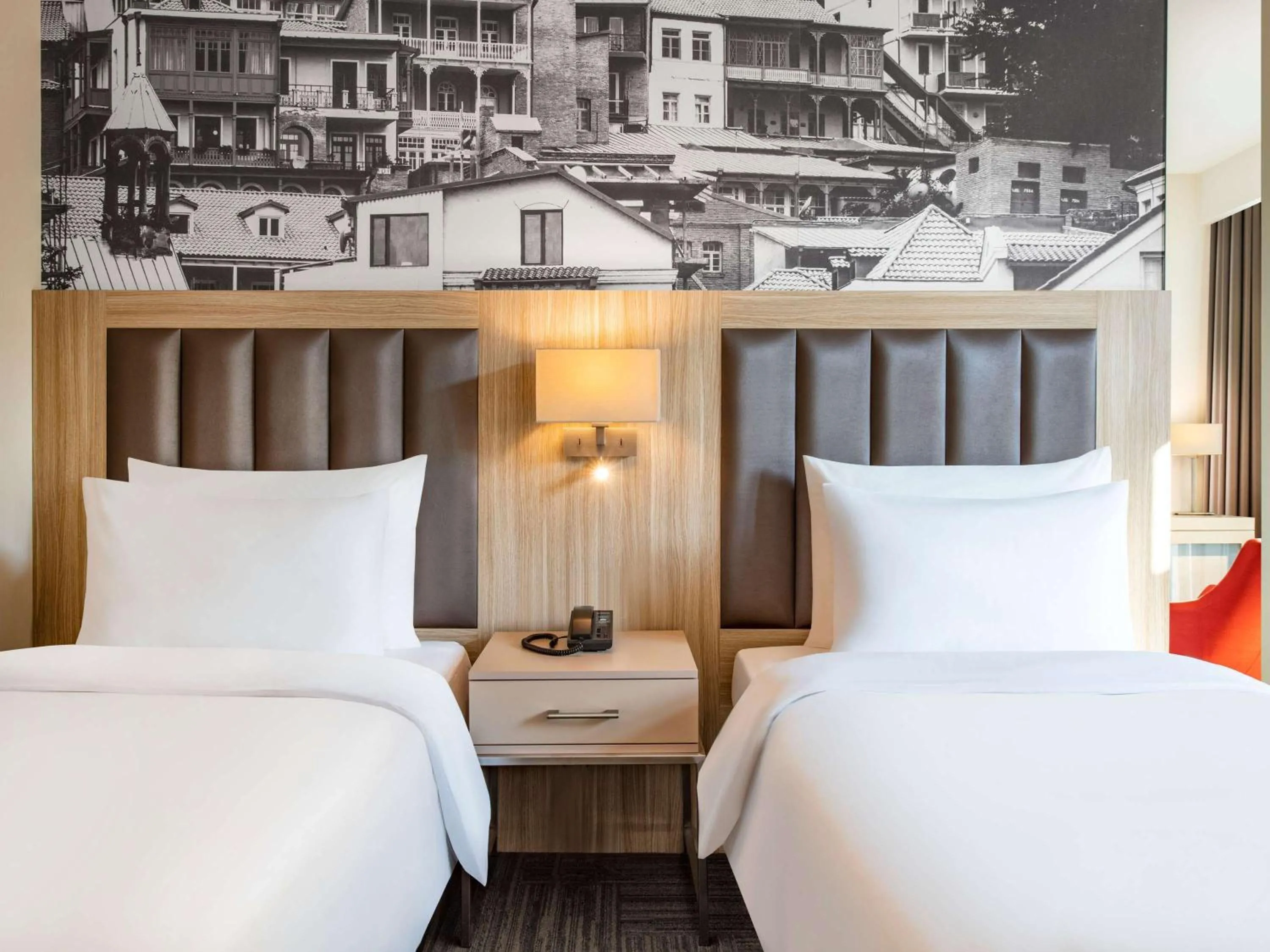 Bed in Ramada Encore Tbilisi