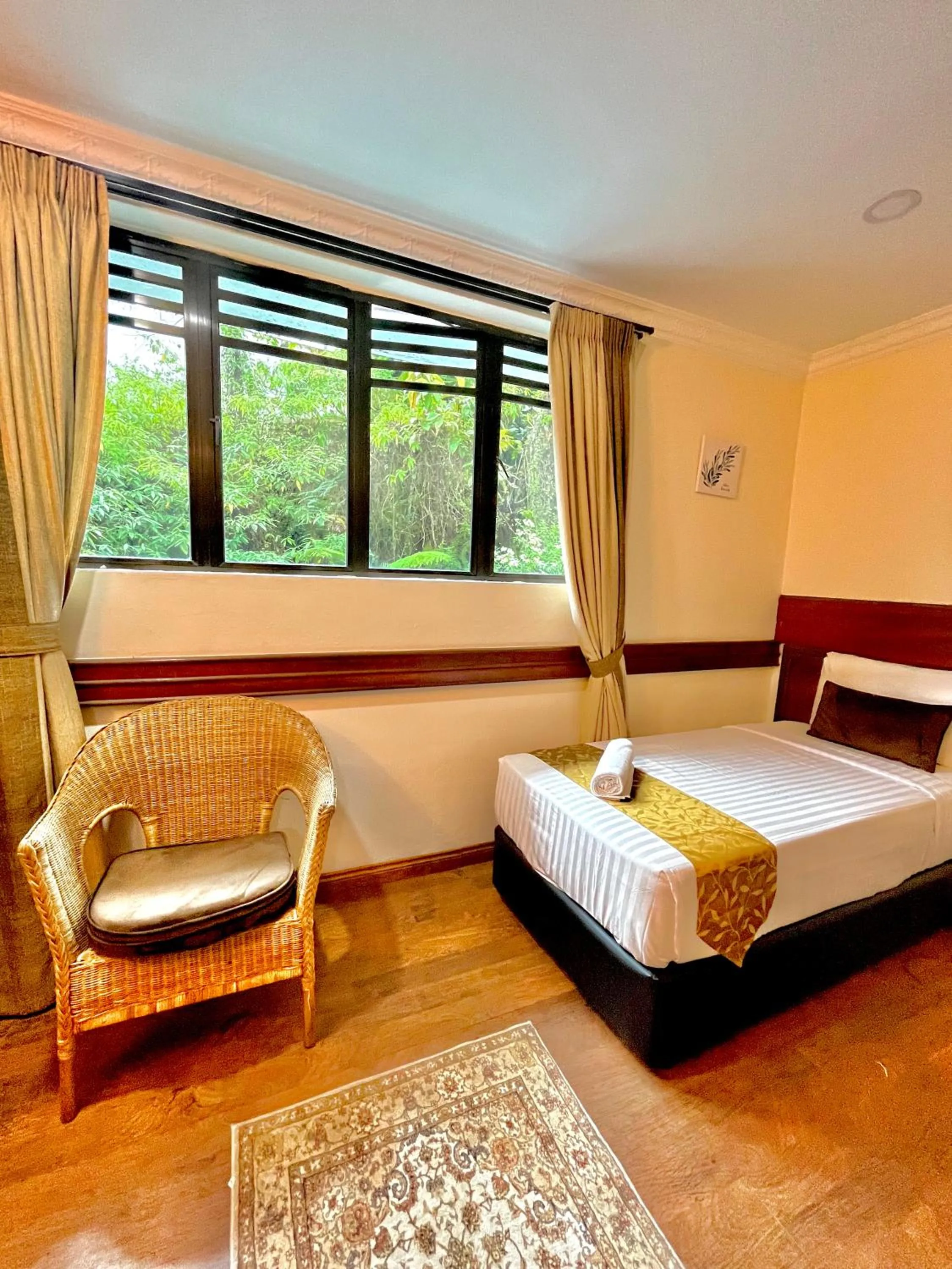 Bed in Melur Inn