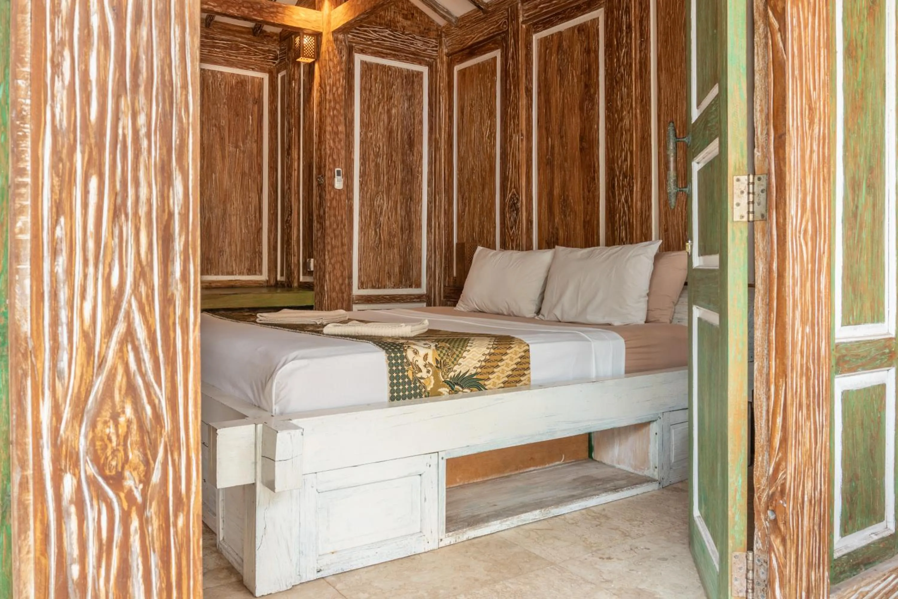 Bed in Jawa House Private Villas
