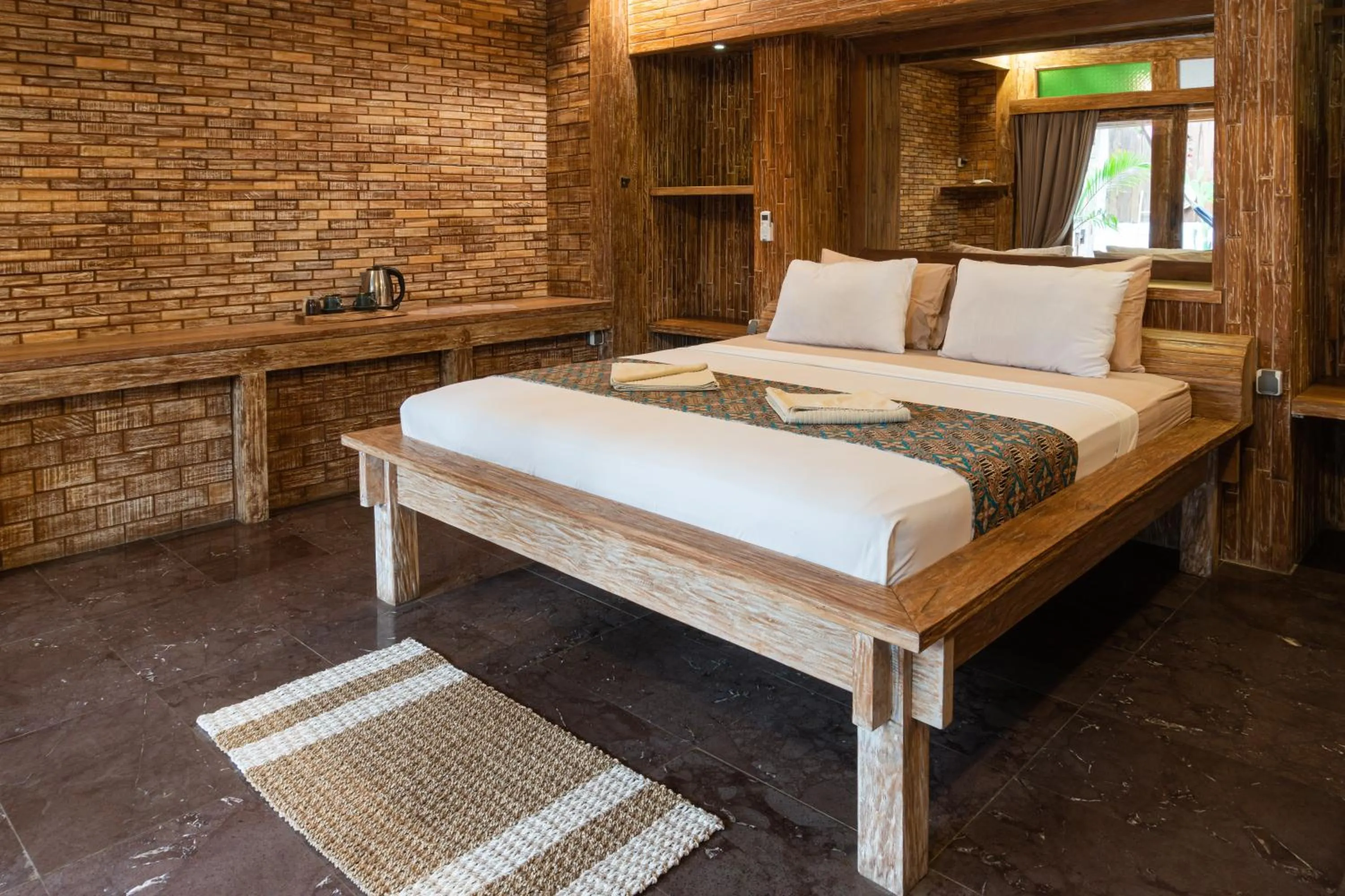 Bed in Jawa House Private Villas