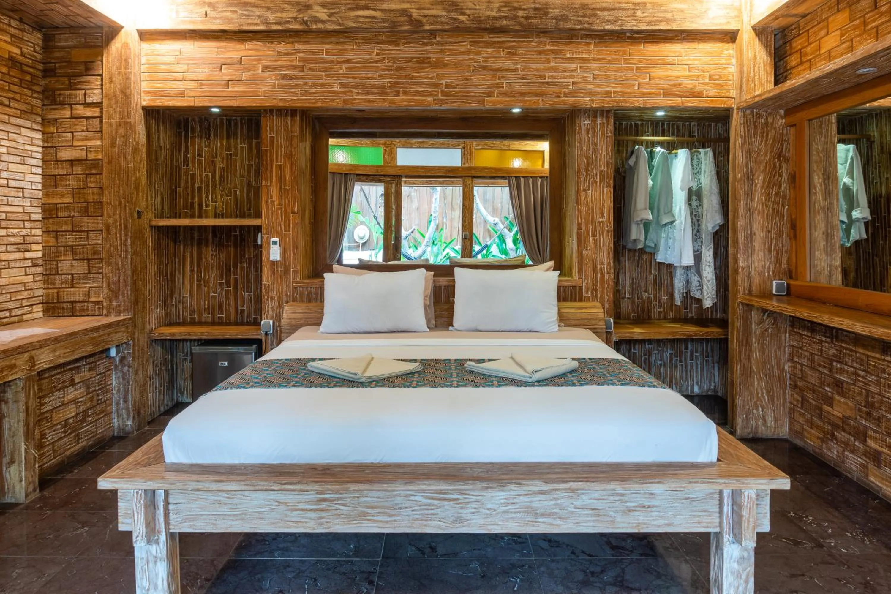 Bed in Jawa House Private Villas