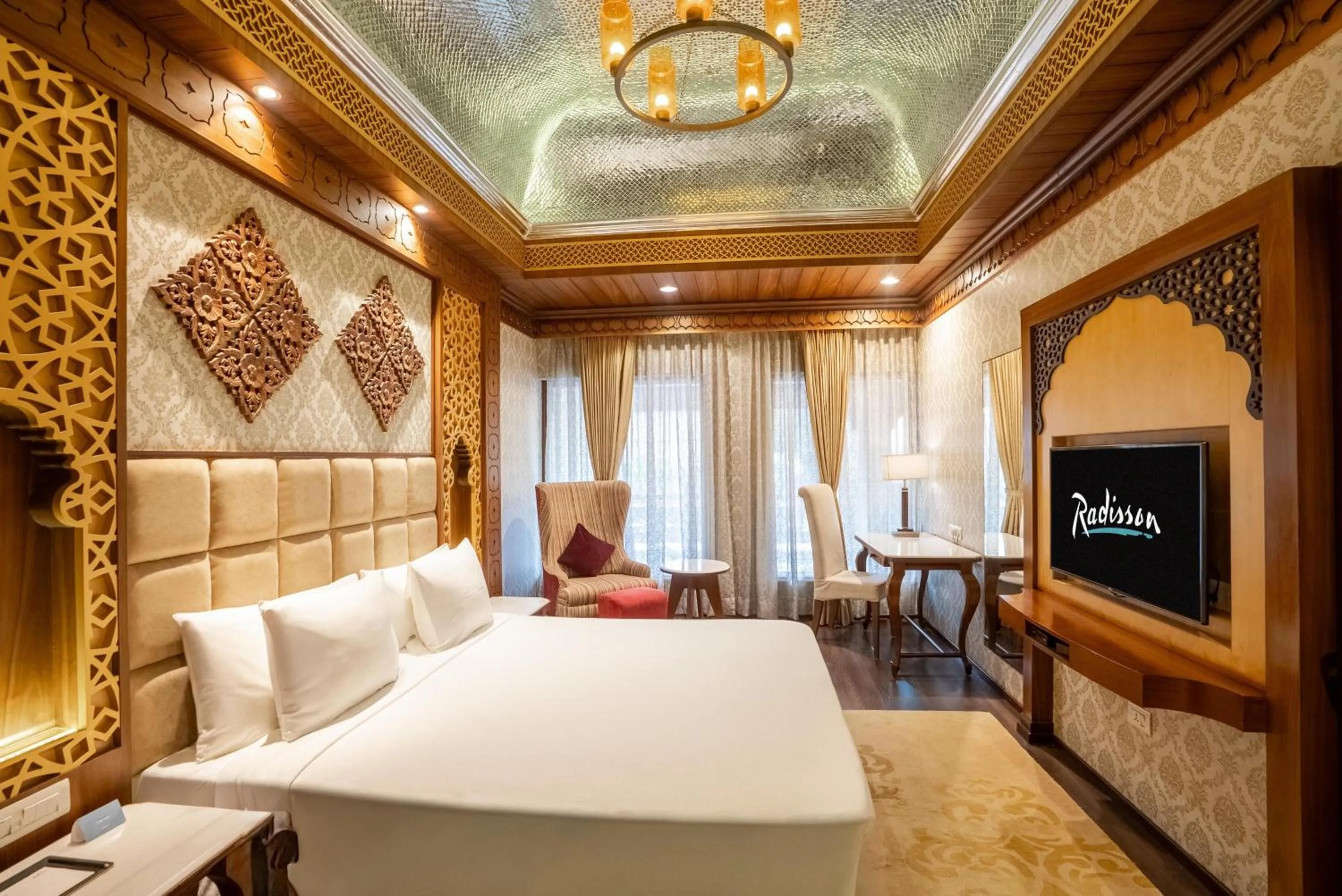 Photo of the whole room, Bed in Radisson Jodhpur