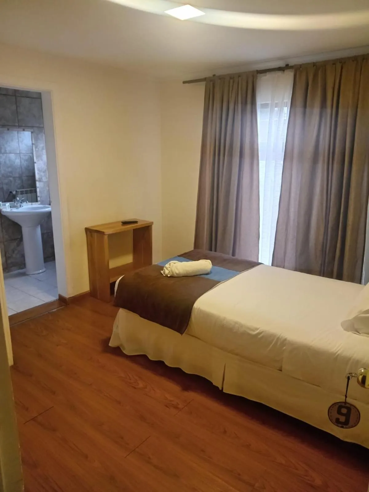 Photo of the whole room, Bed in Hostal Doble E Patagonia