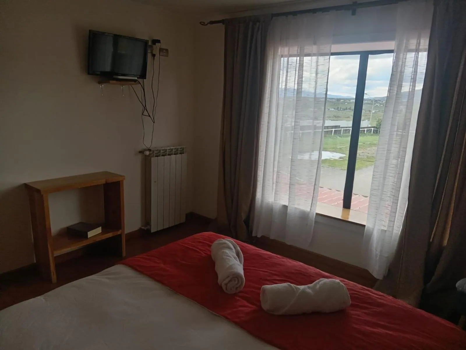 Photo of the whole room, Bed in Hostal Doble E Patagonia