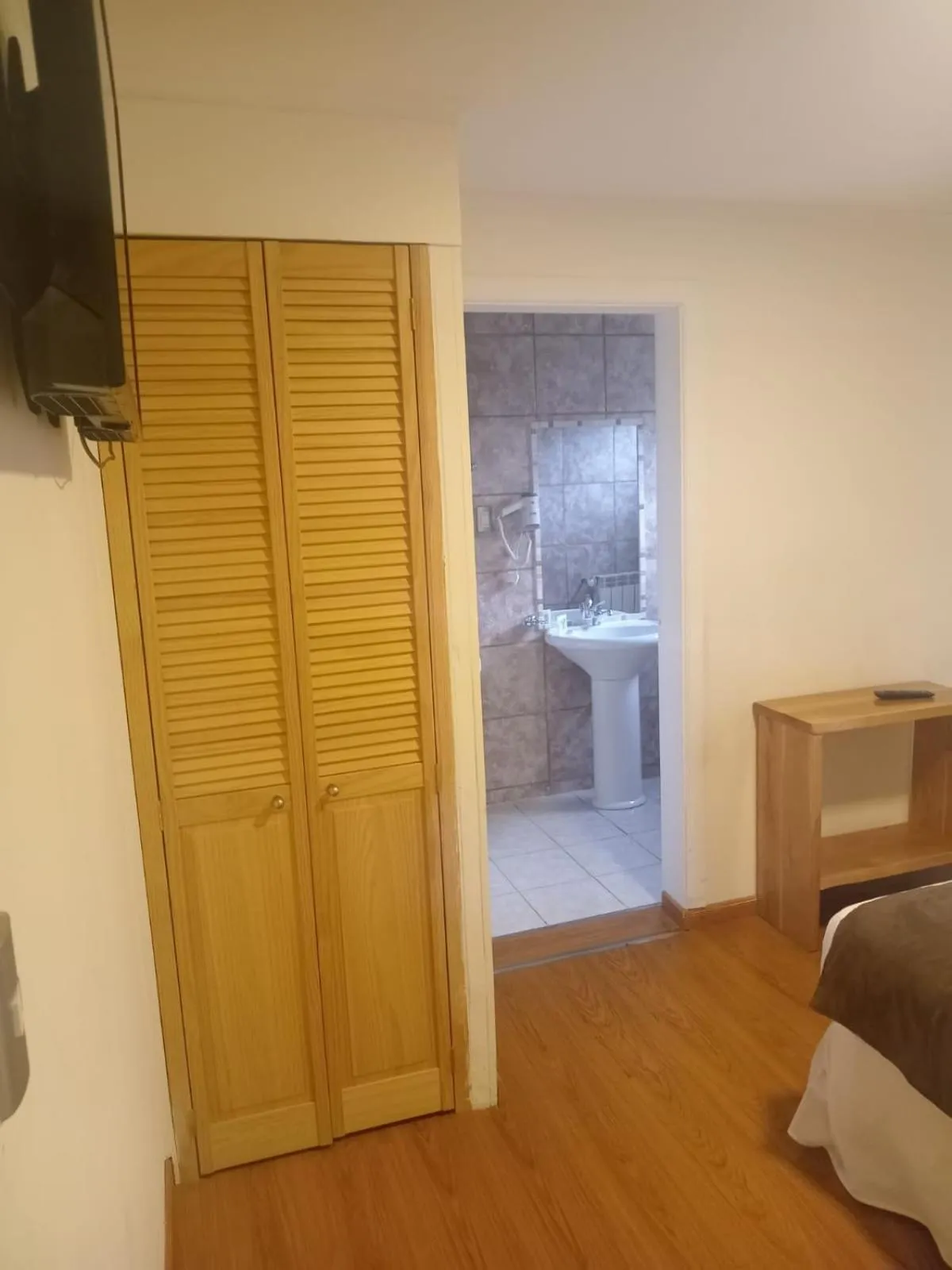 Photo of the whole room, Bed in Hostal Doble E Patagonia