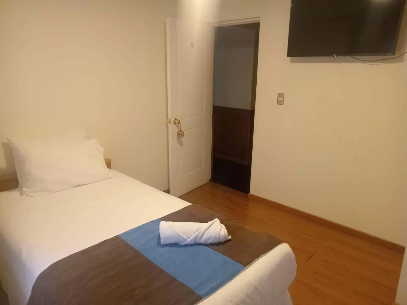 Photo of the whole room, Bed in Hostal Doble E Patagonia