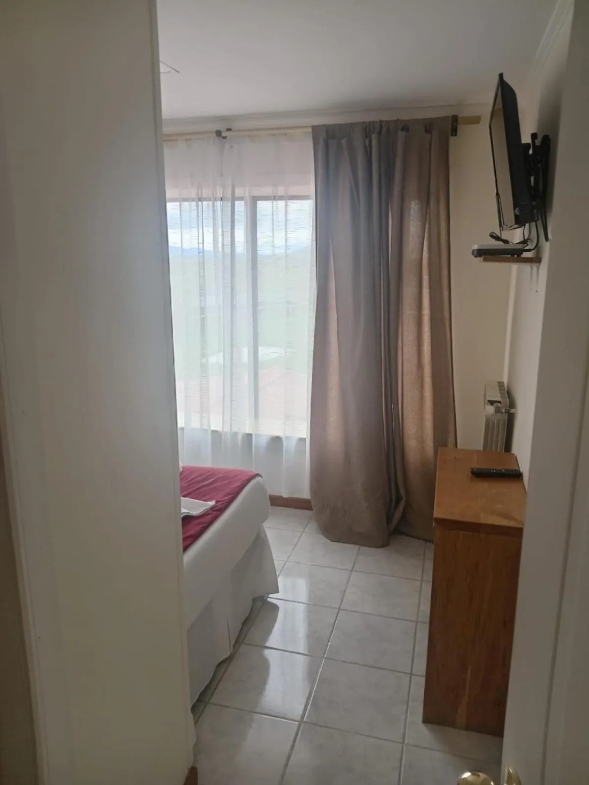 Photo of the whole room, Bed in Hostal Doble E Patagonia