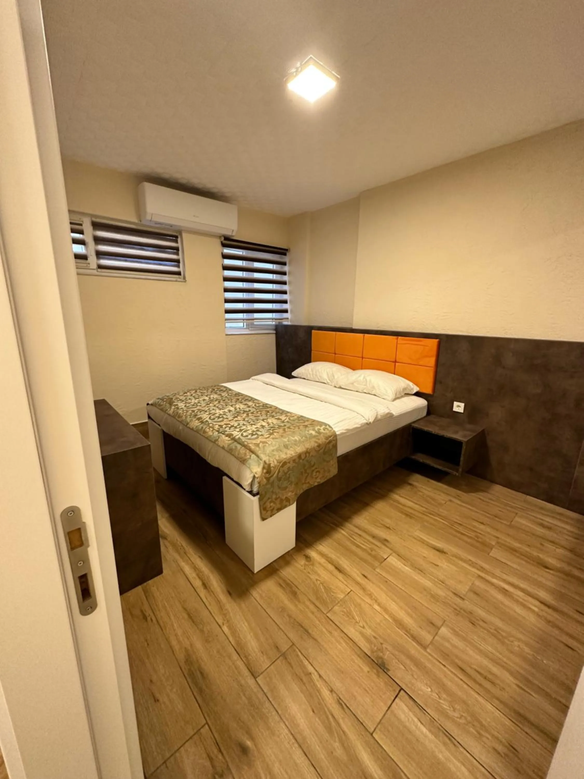 Bed in Ale Boutique Apartments