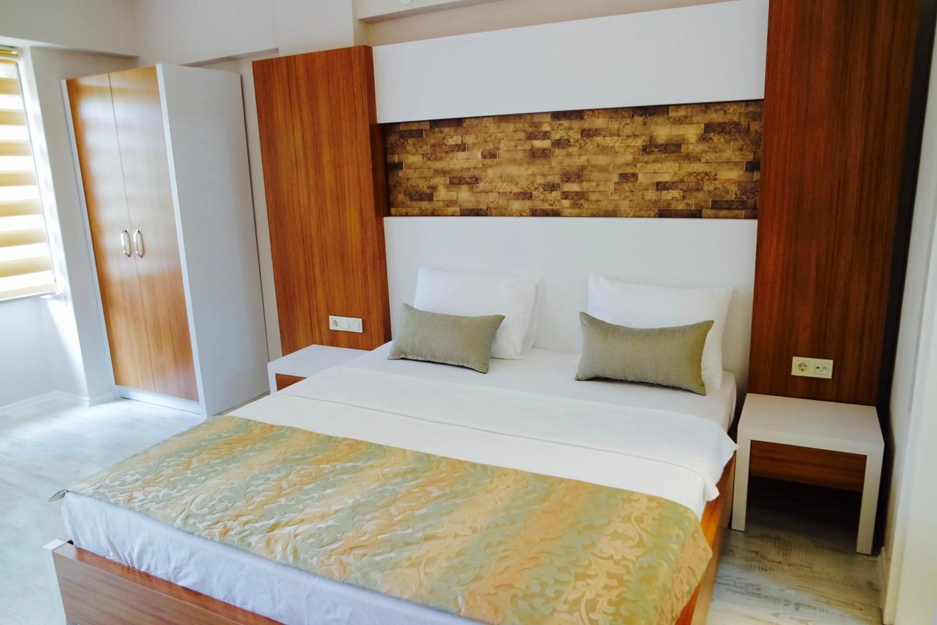 Bed in Ale Boutique Apartments