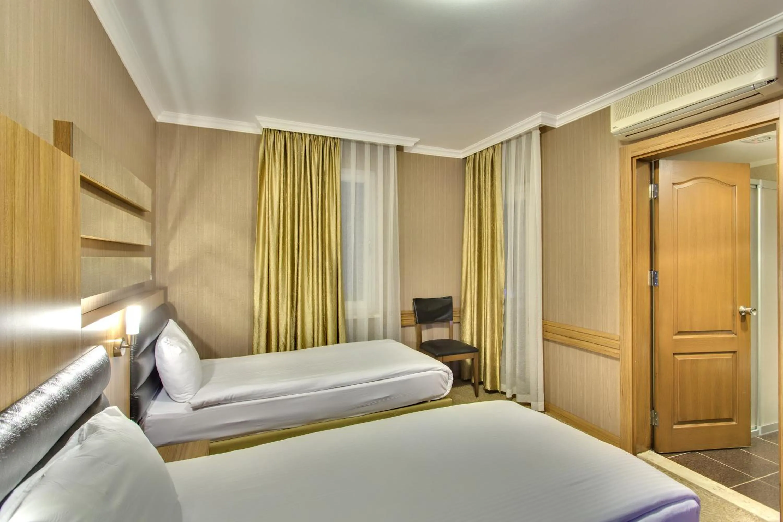 Photo of the whole room, Bed in Antroyal Hotel