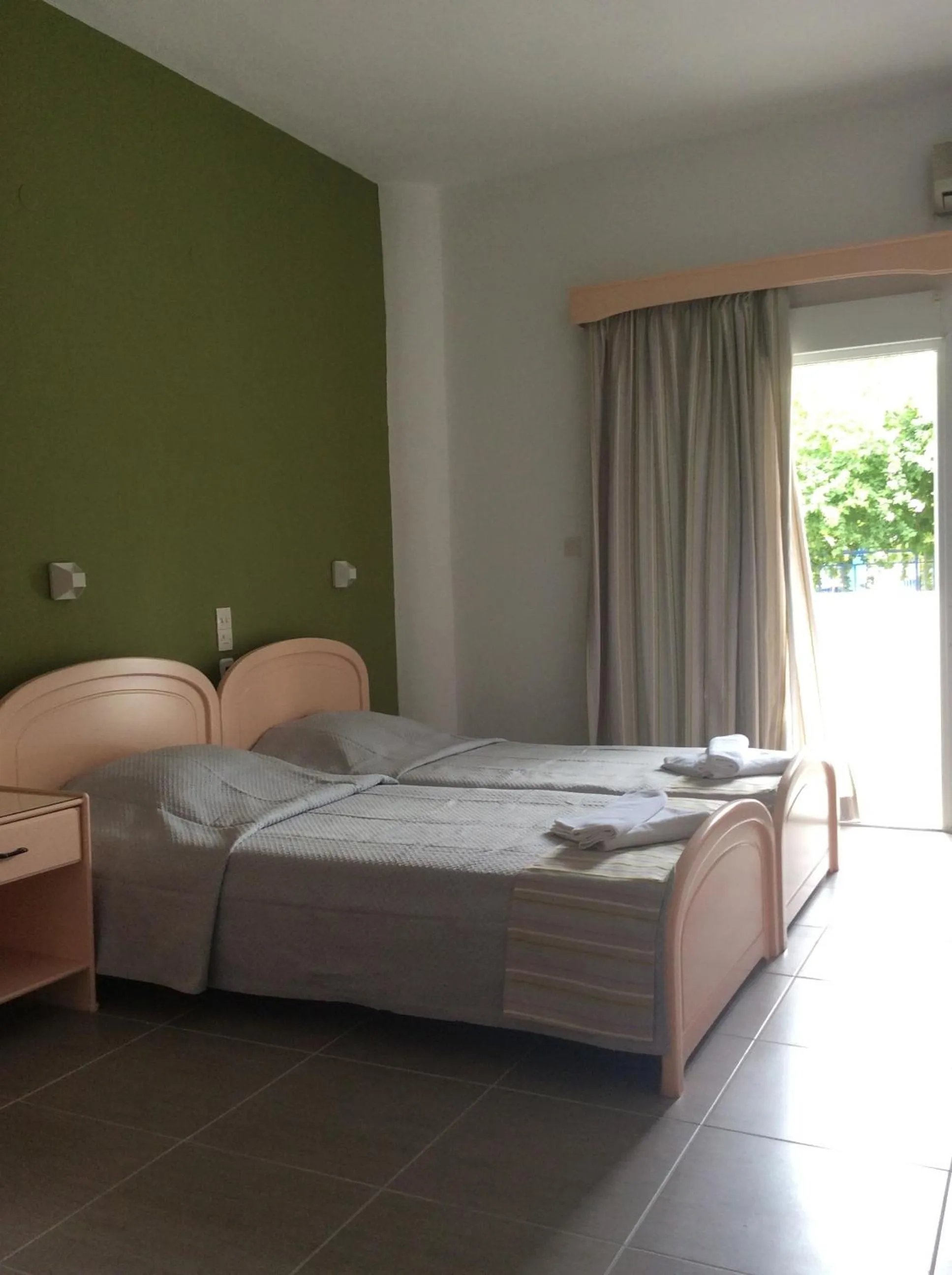 Bed in Ifigenia Hotel