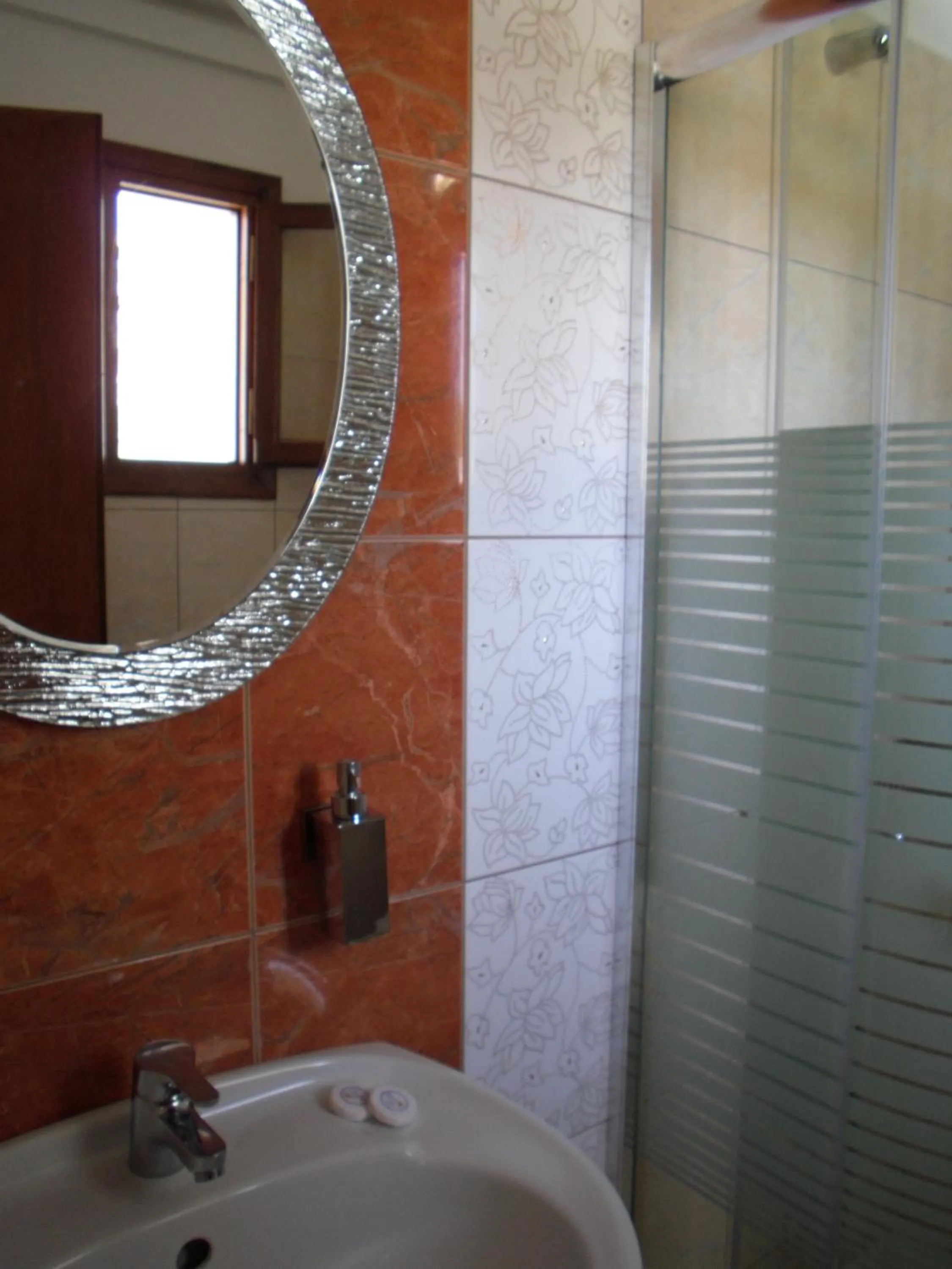Bathroom in Ifigenia Hotel