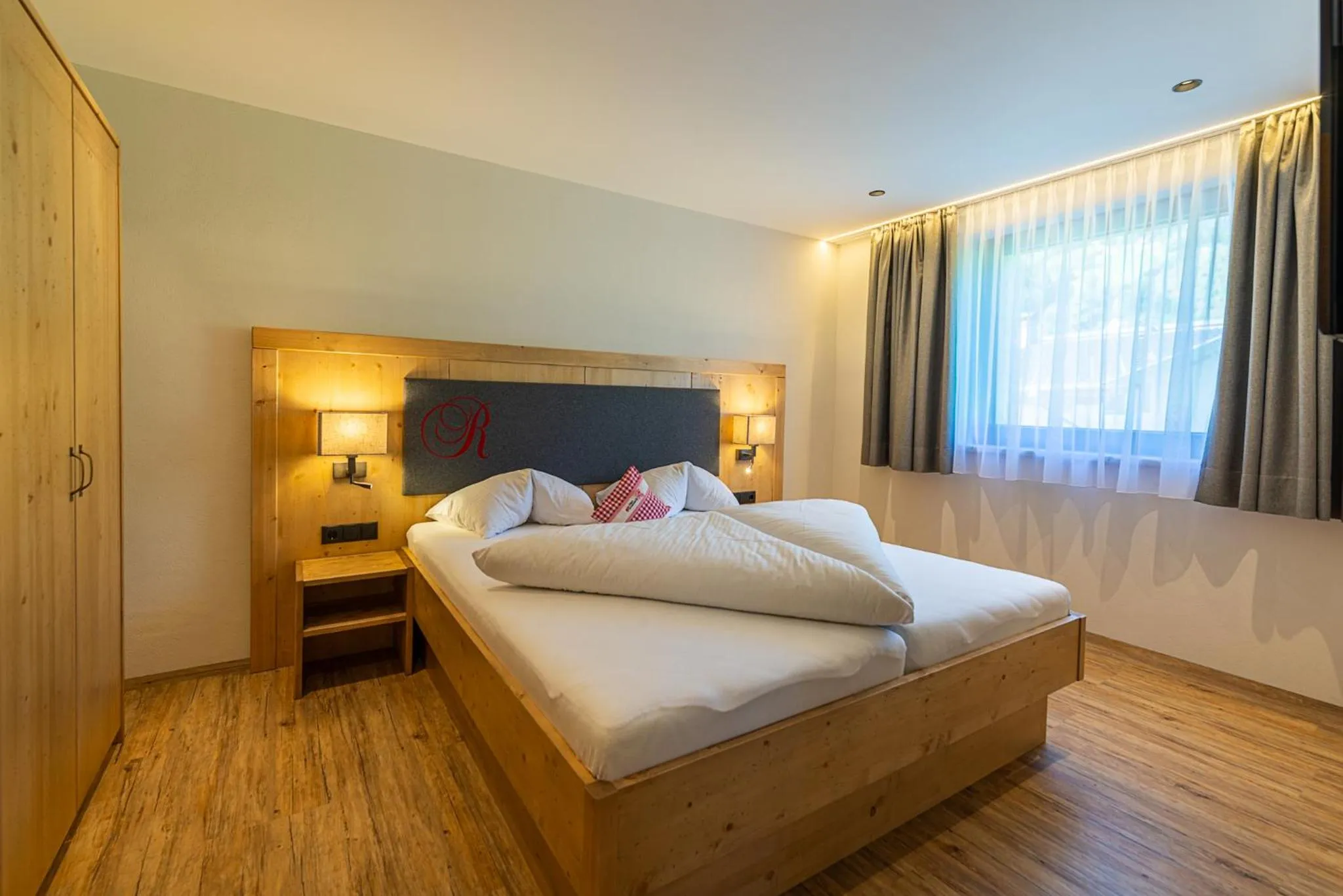 Photo of the whole room, Bed in Hotel Garni Romantik