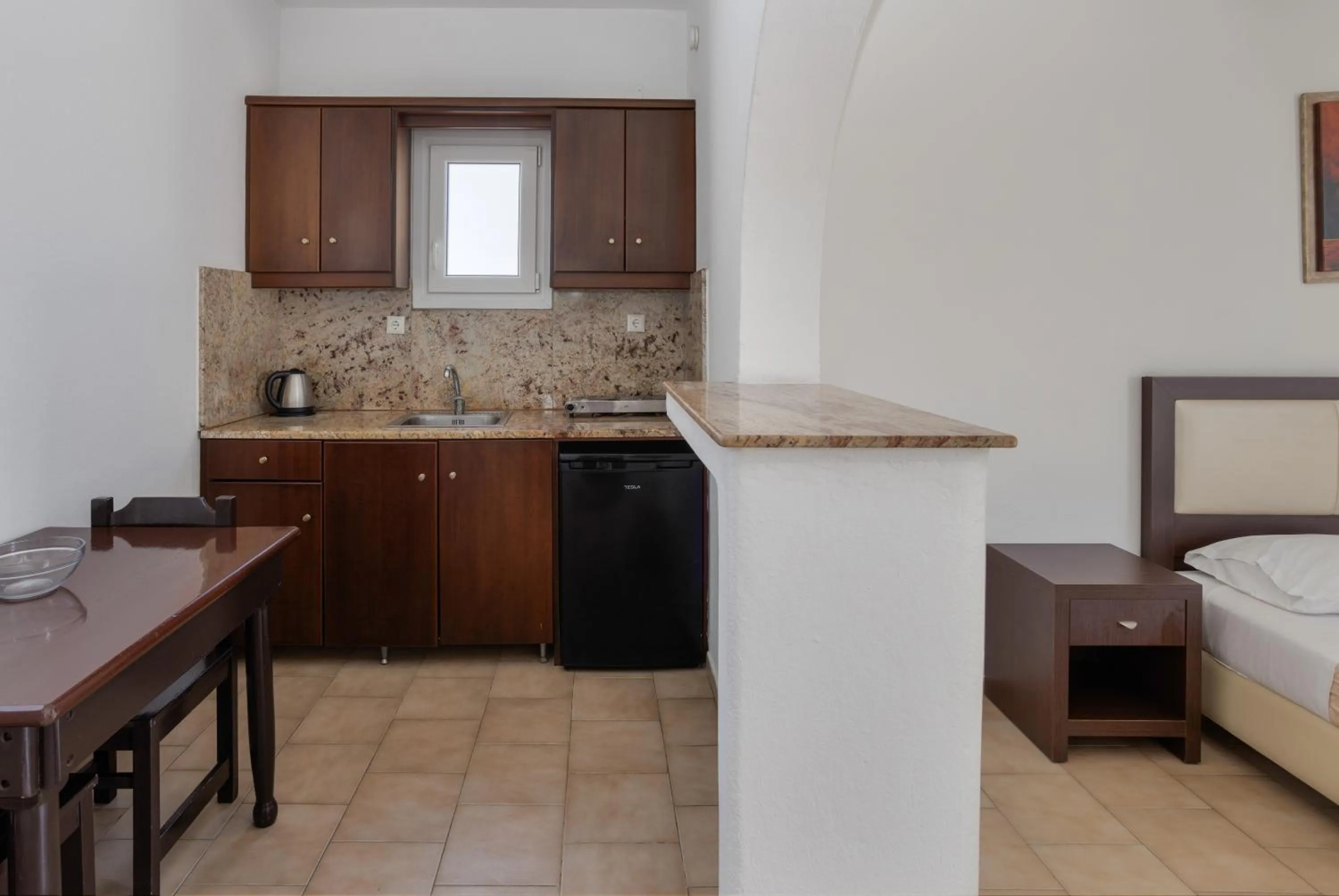 Kitchen or kitchenette, Bed in Elena Studios & Suites