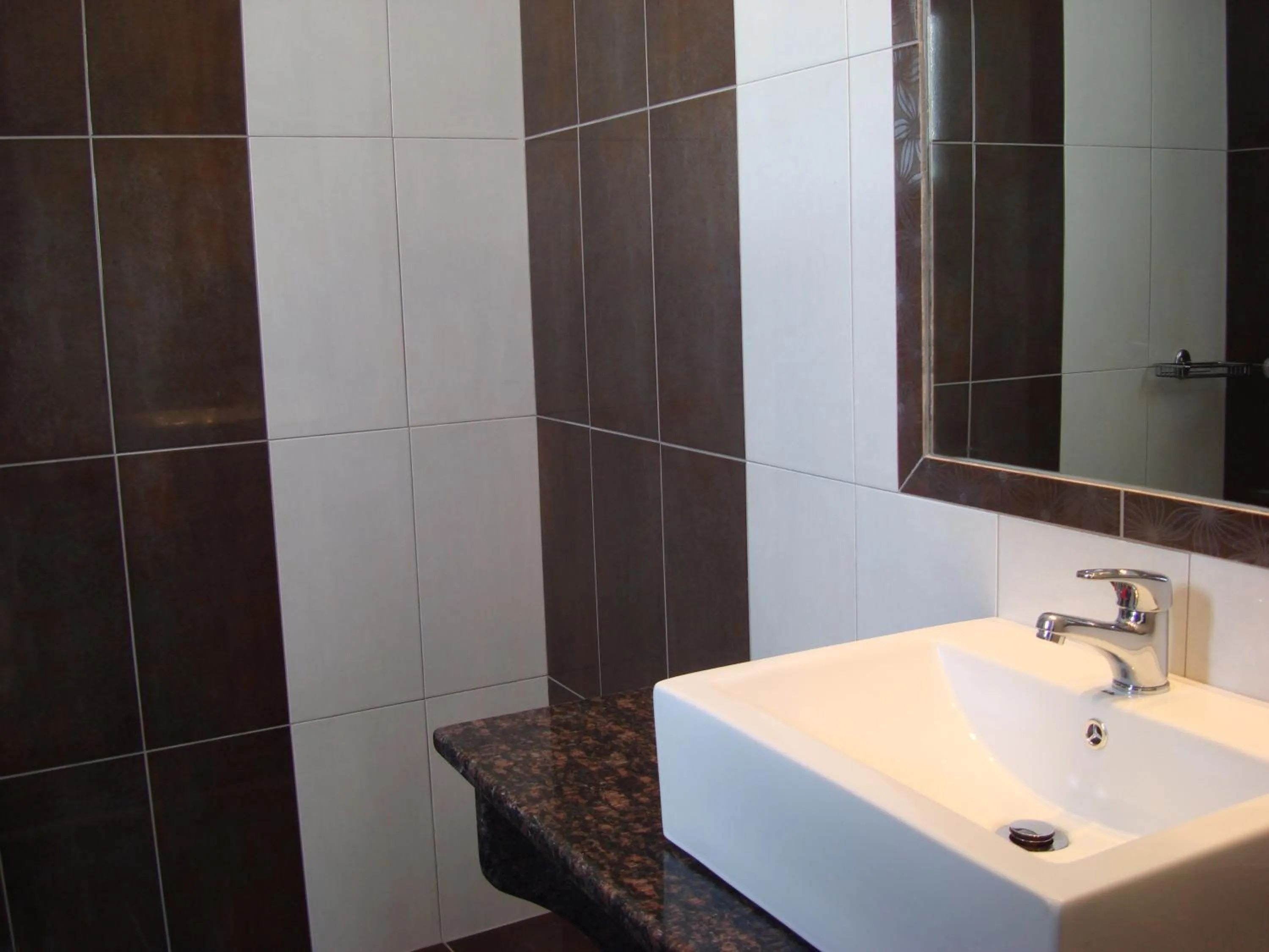 Shower in Elena Studios & Suites