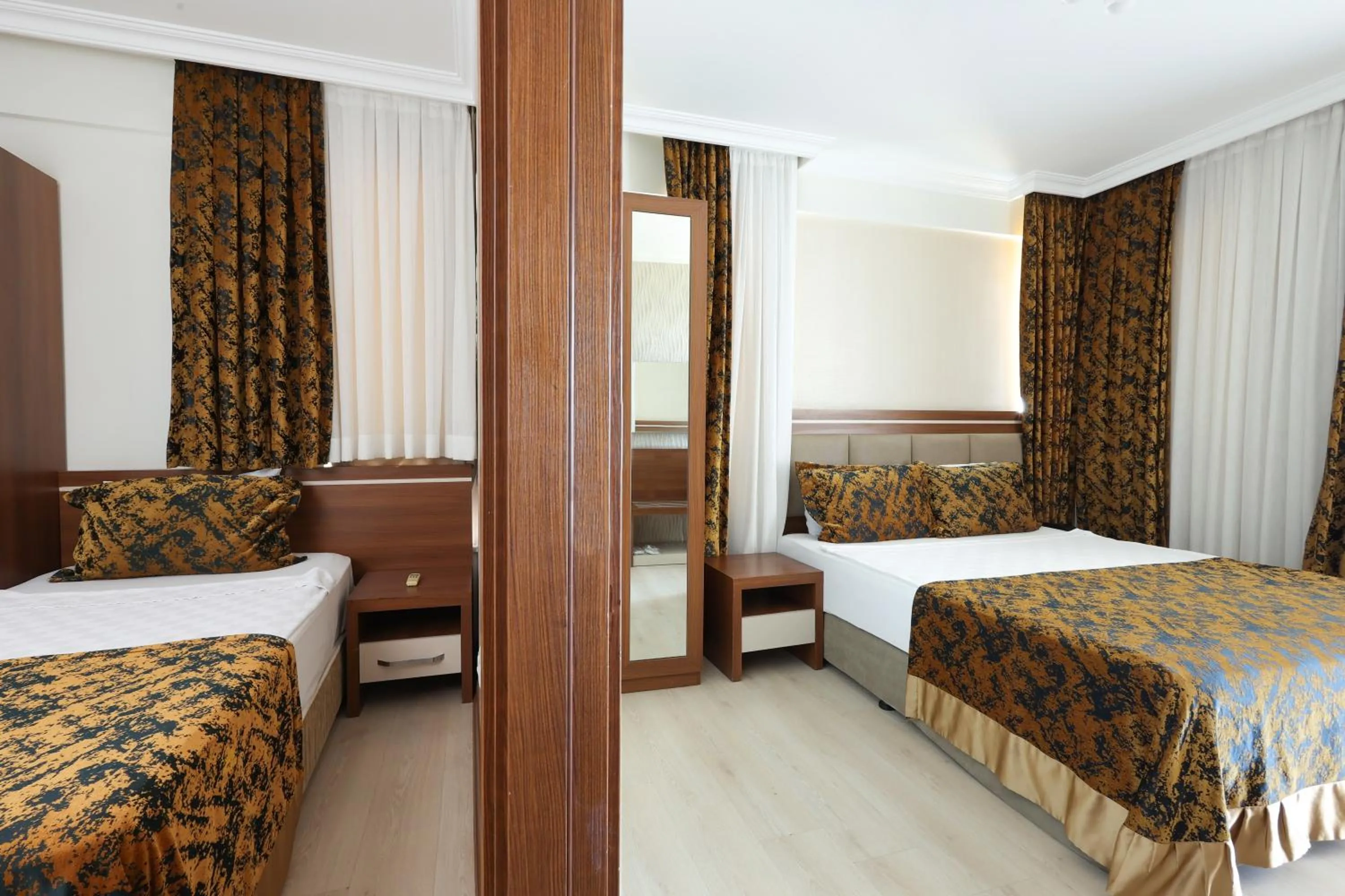 Bed in The Corner Park Hotel