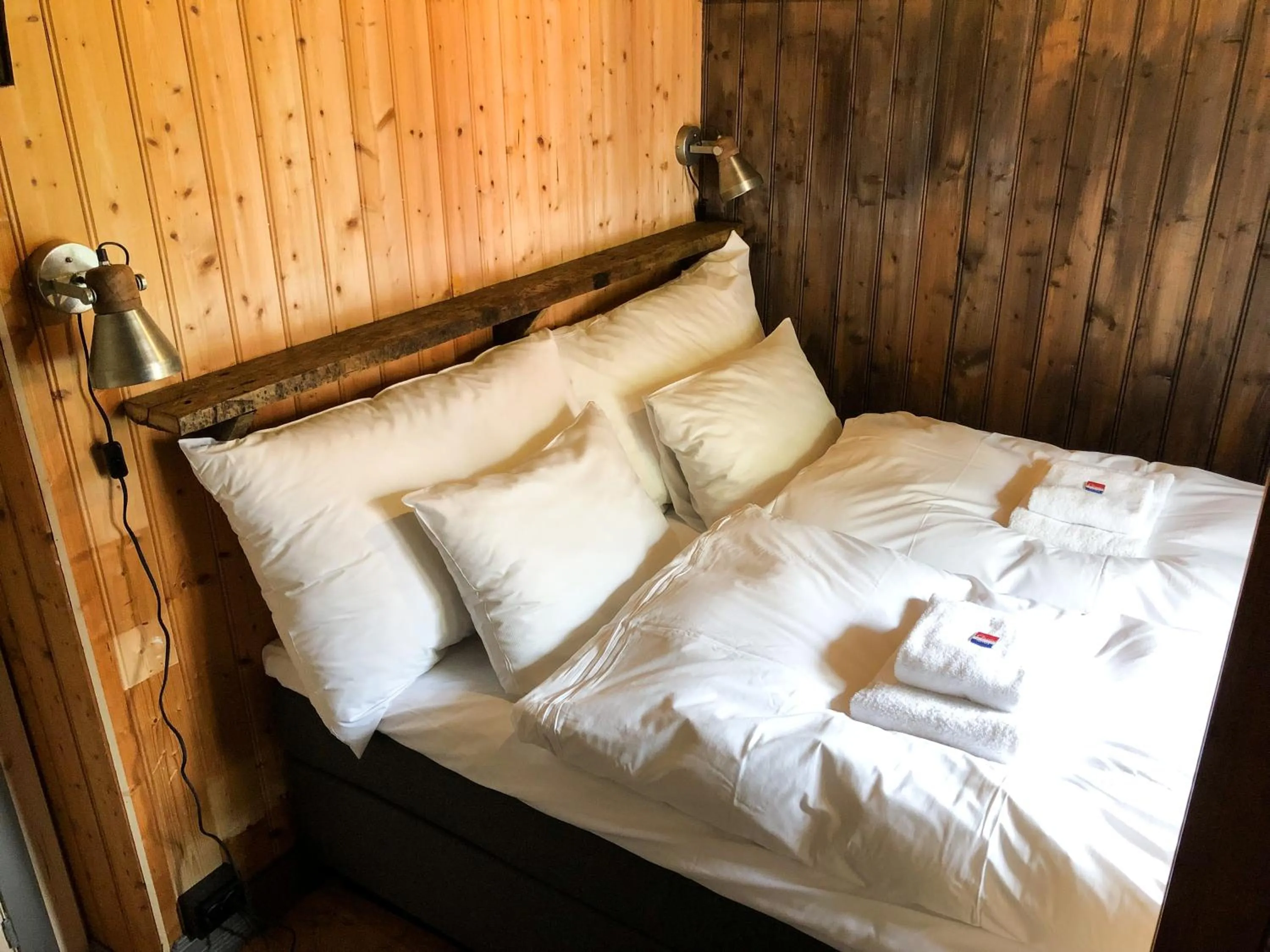 Bedroom, Bed in Reine Rorbuer - by Classic Norway Hotels
