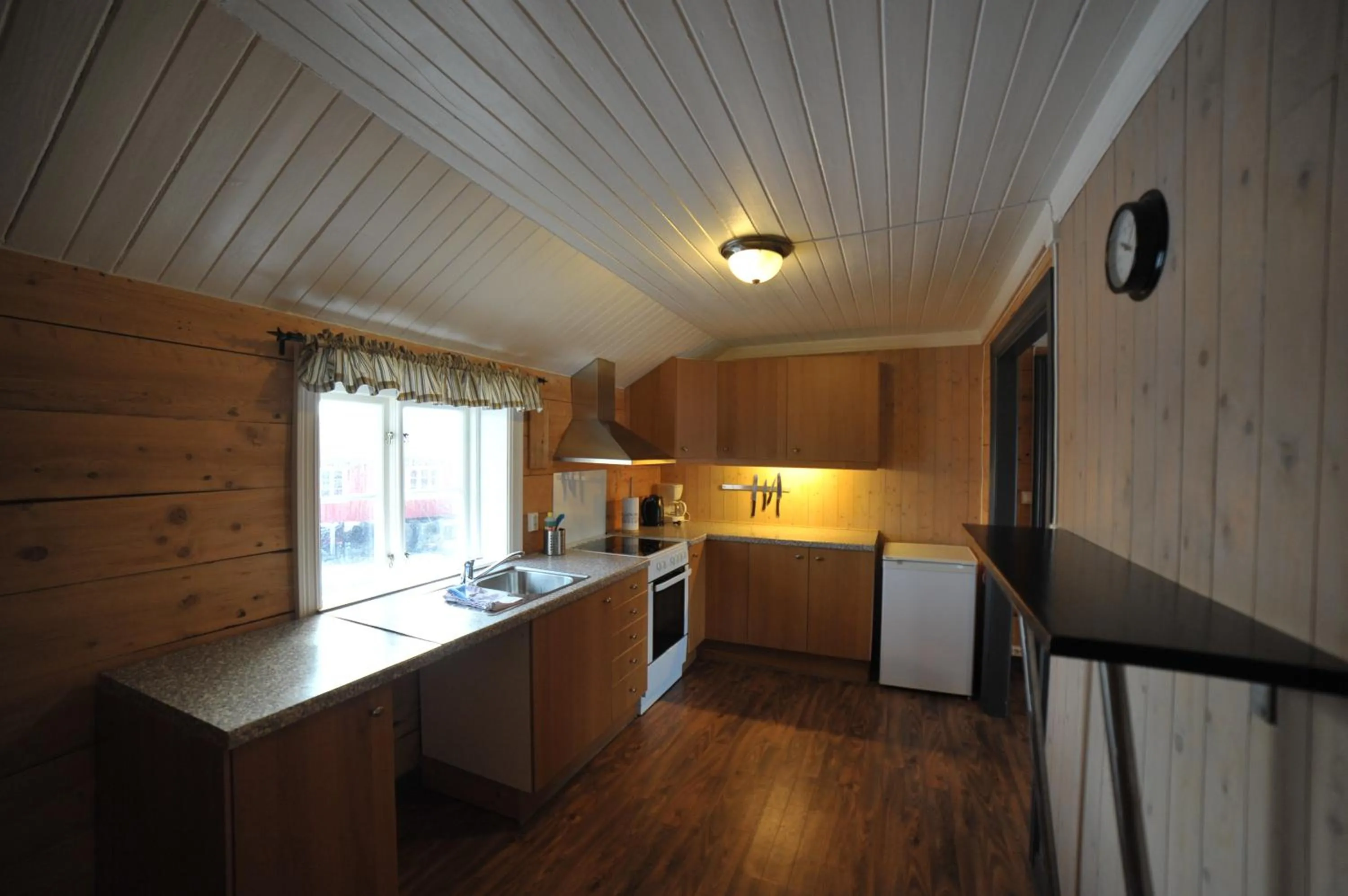 kitchen in Reine Rorbuer - by Classic Norway Hotels