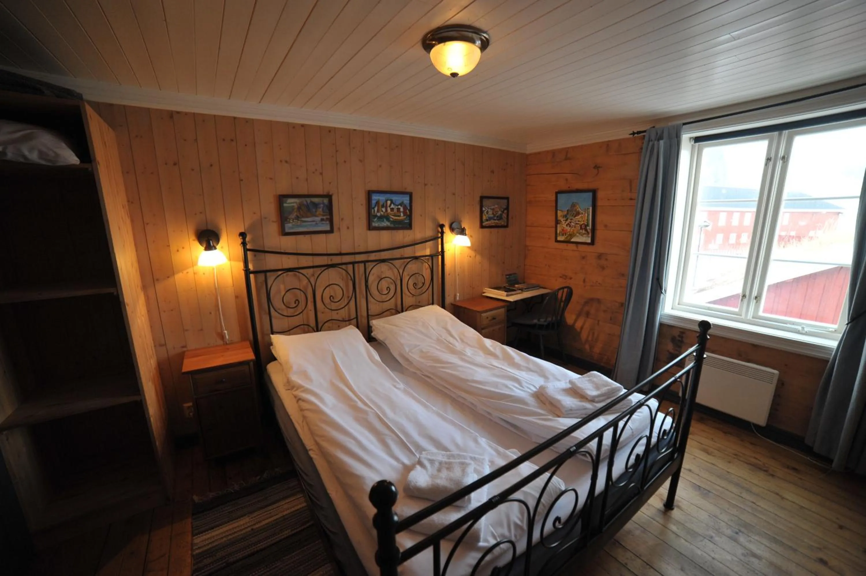 Bedroom, Bed in Reine Rorbuer - by Classic Norway Hotels