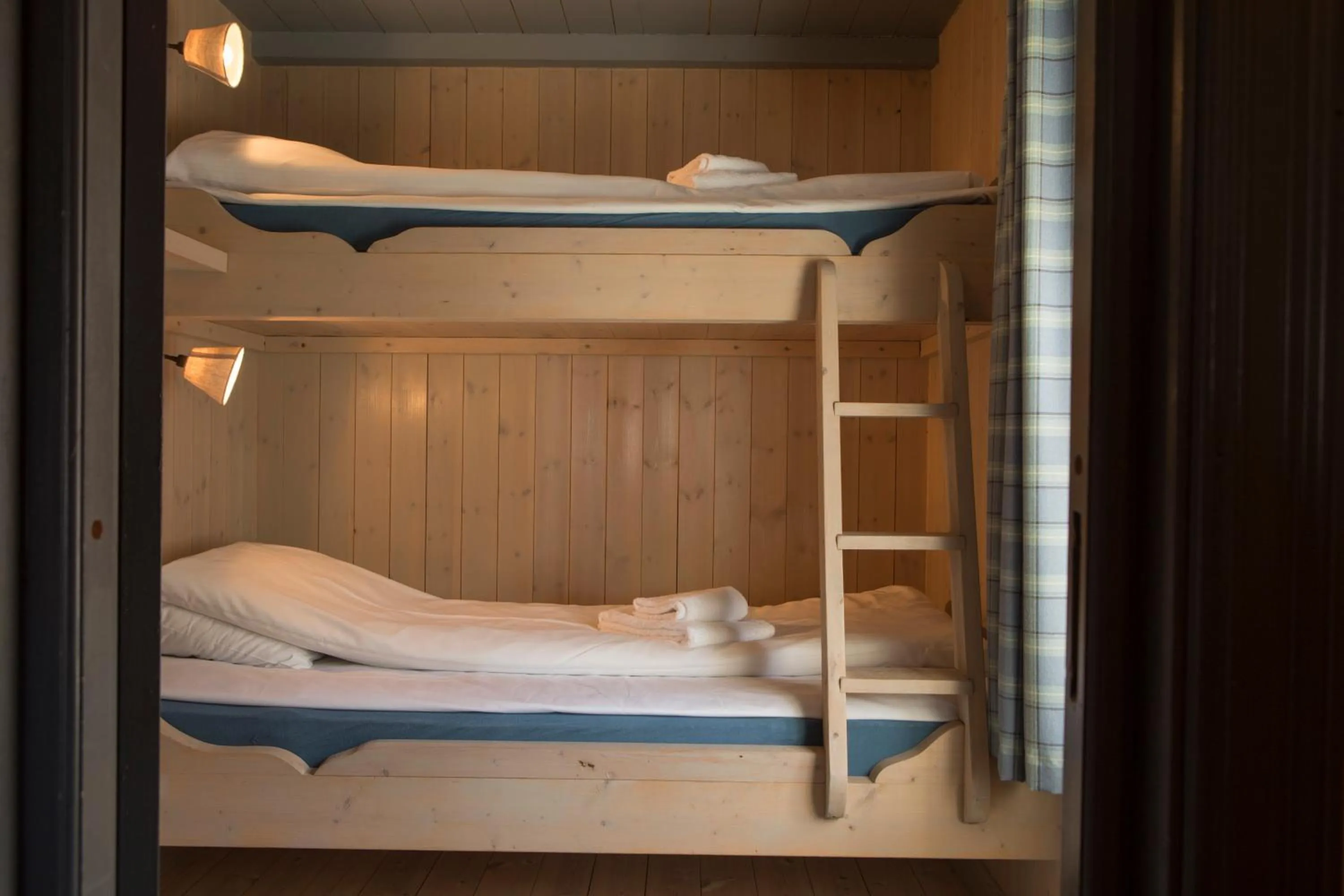 Bedroom, Bed in Reine Rorbuer - by Classic Norway Hotels