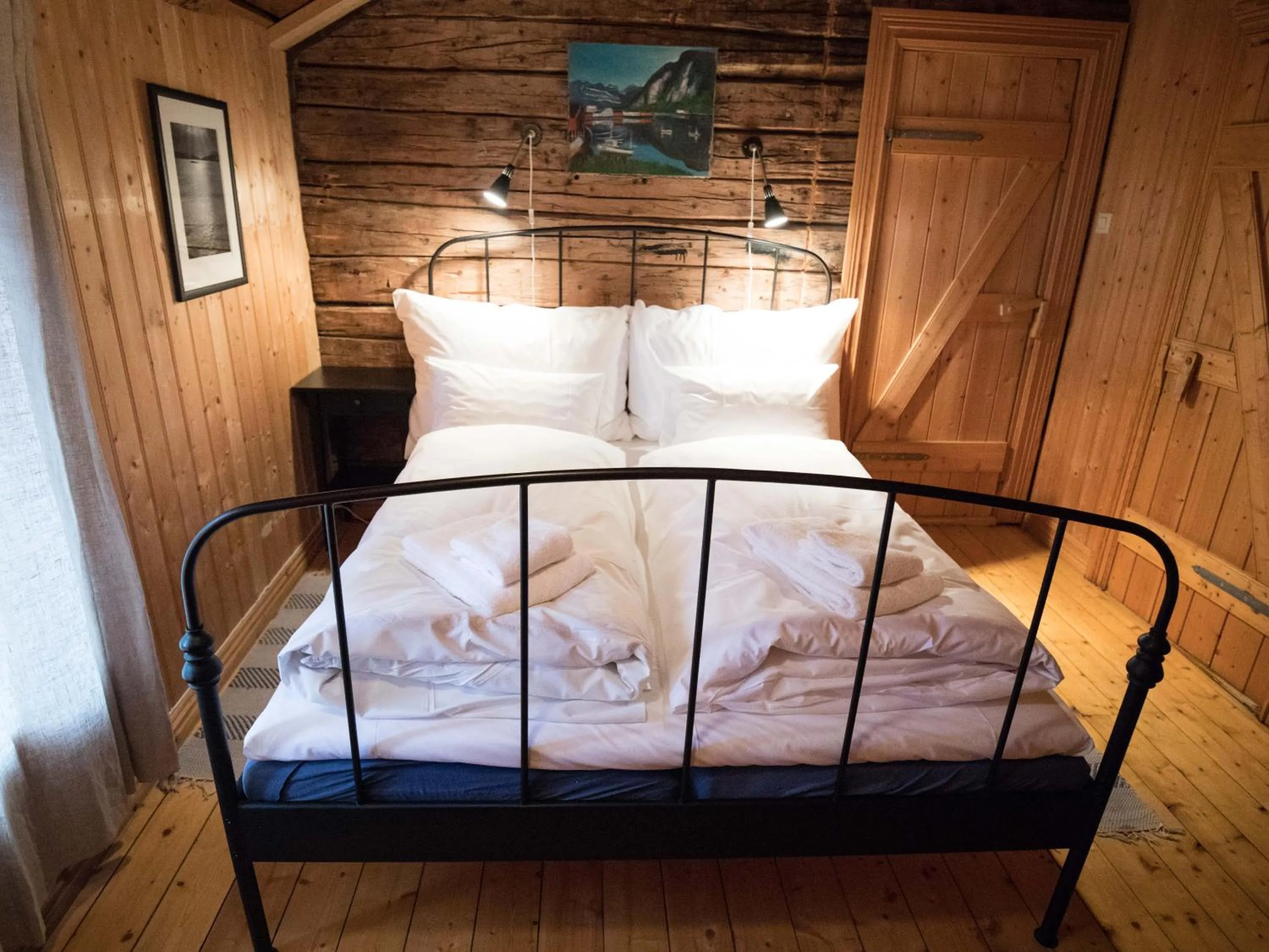 Bedroom, Bed in Reine Rorbuer - by Classic Norway Hotels