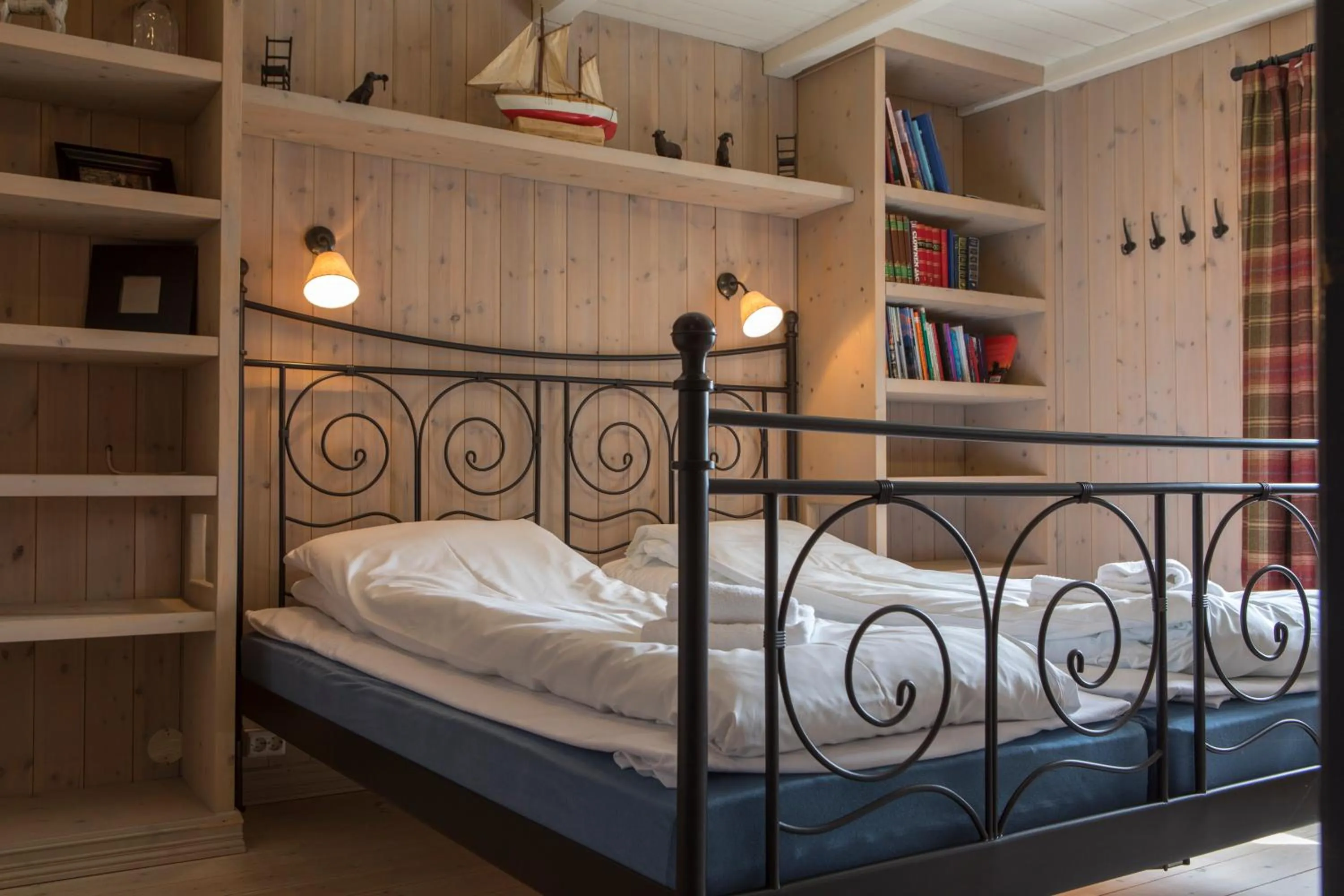 Bedroom, Bed in Reine Rorbuer - by Classic Norway Hotels