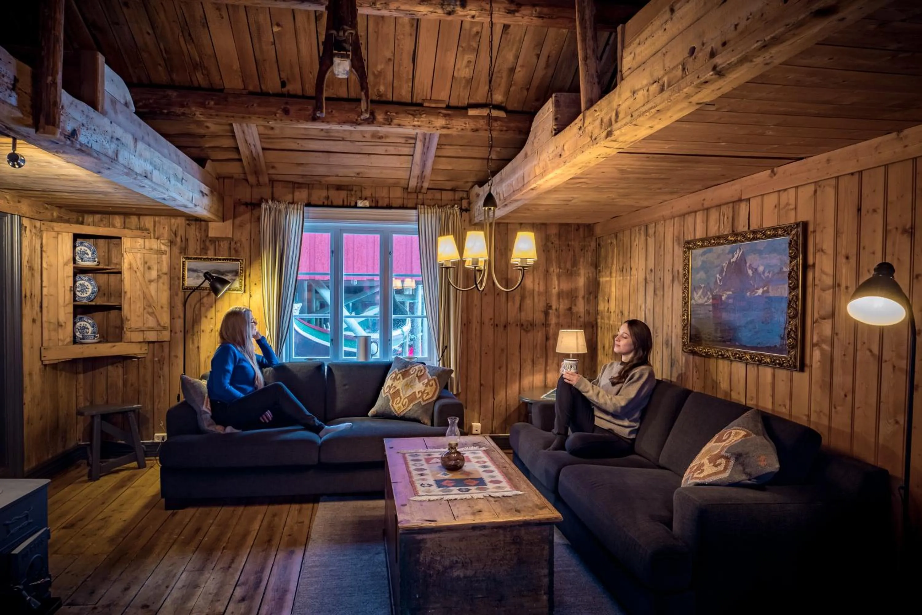 Living room in Reine Rorbuer - by Classic Norway Hotels