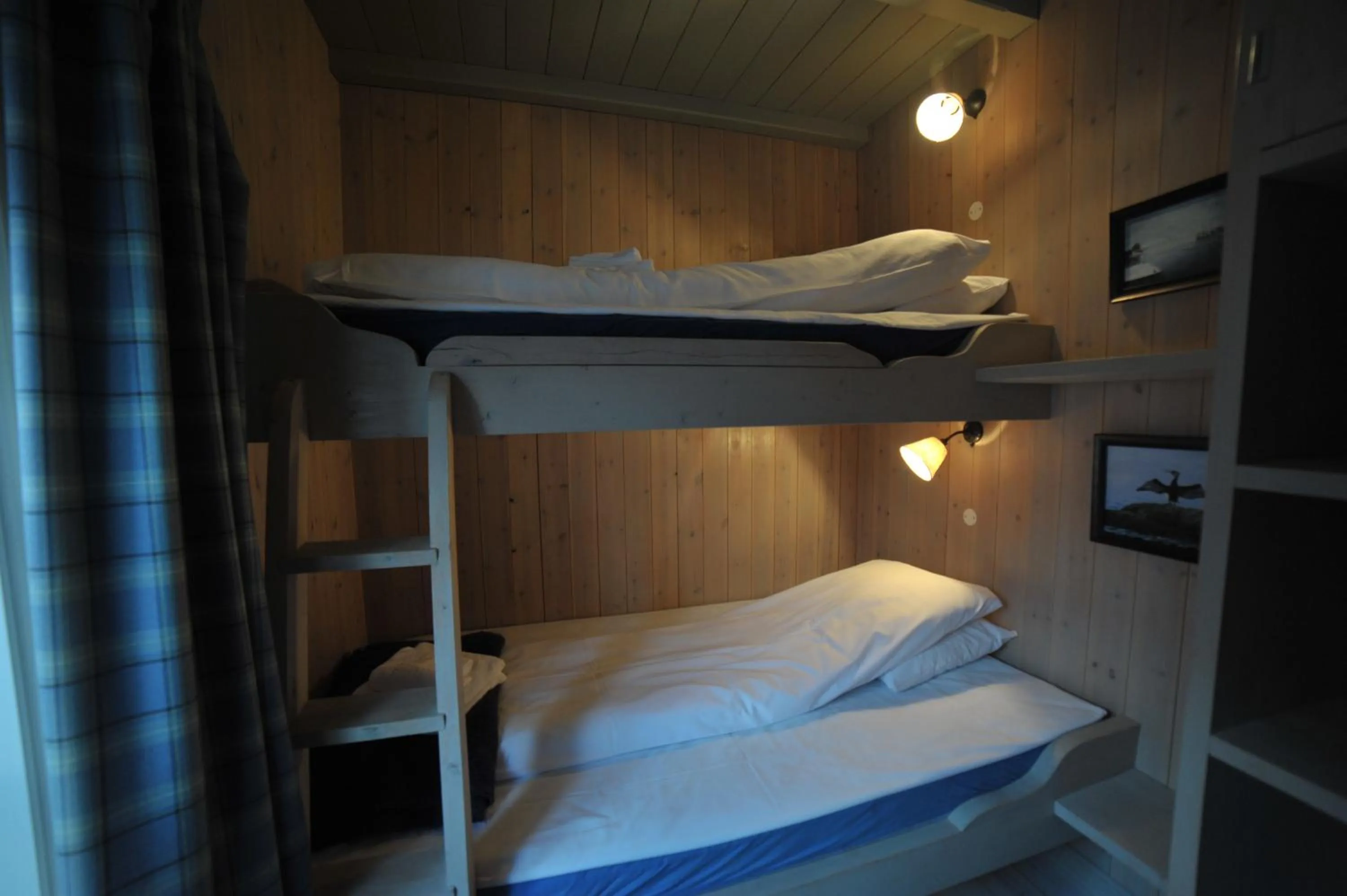 Bedroom, Bed in Reine Rorbuer - by Classic Norway Hotels