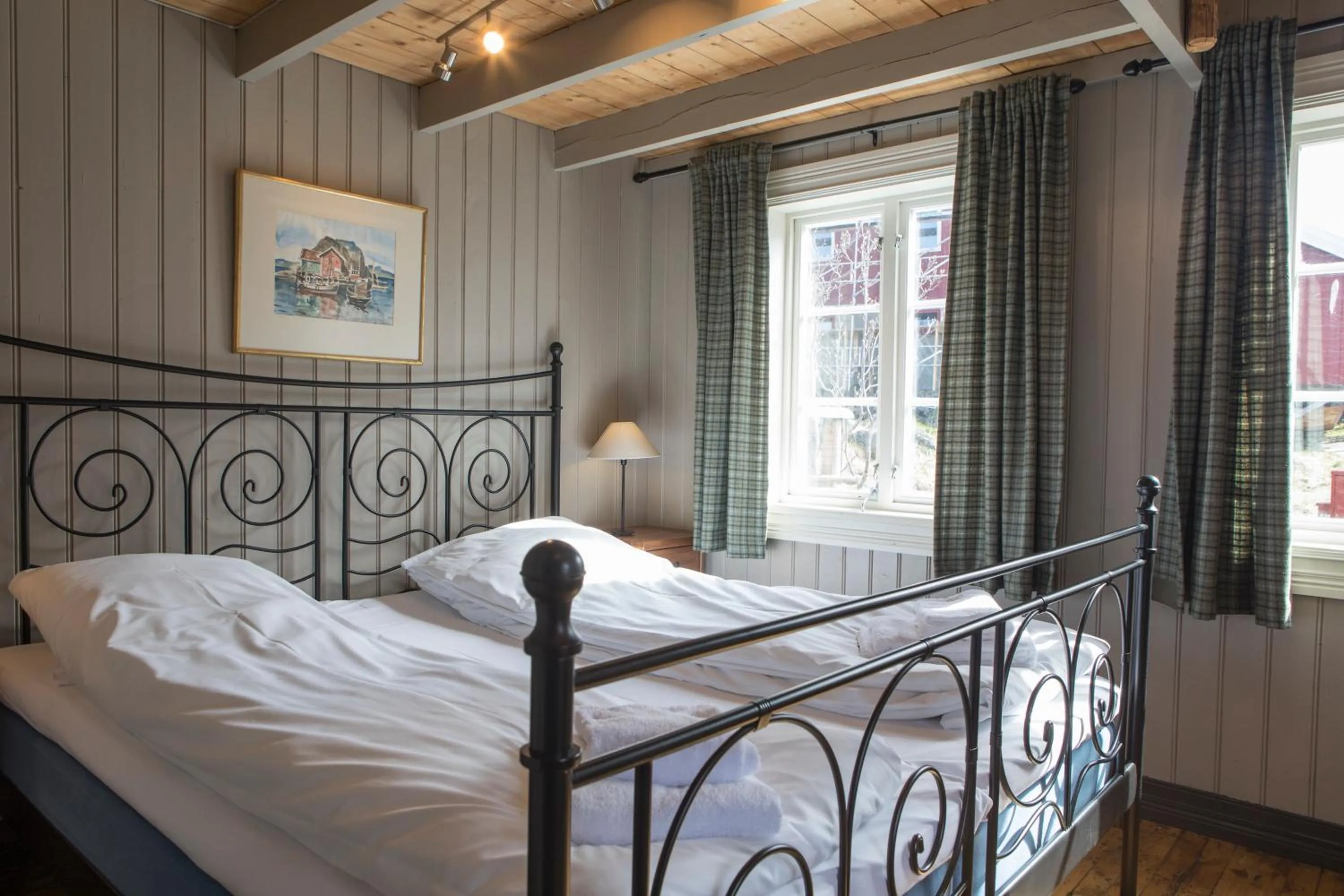 Bedroom, Bed in Reine Rorbuer - by Classic Norway Hotels