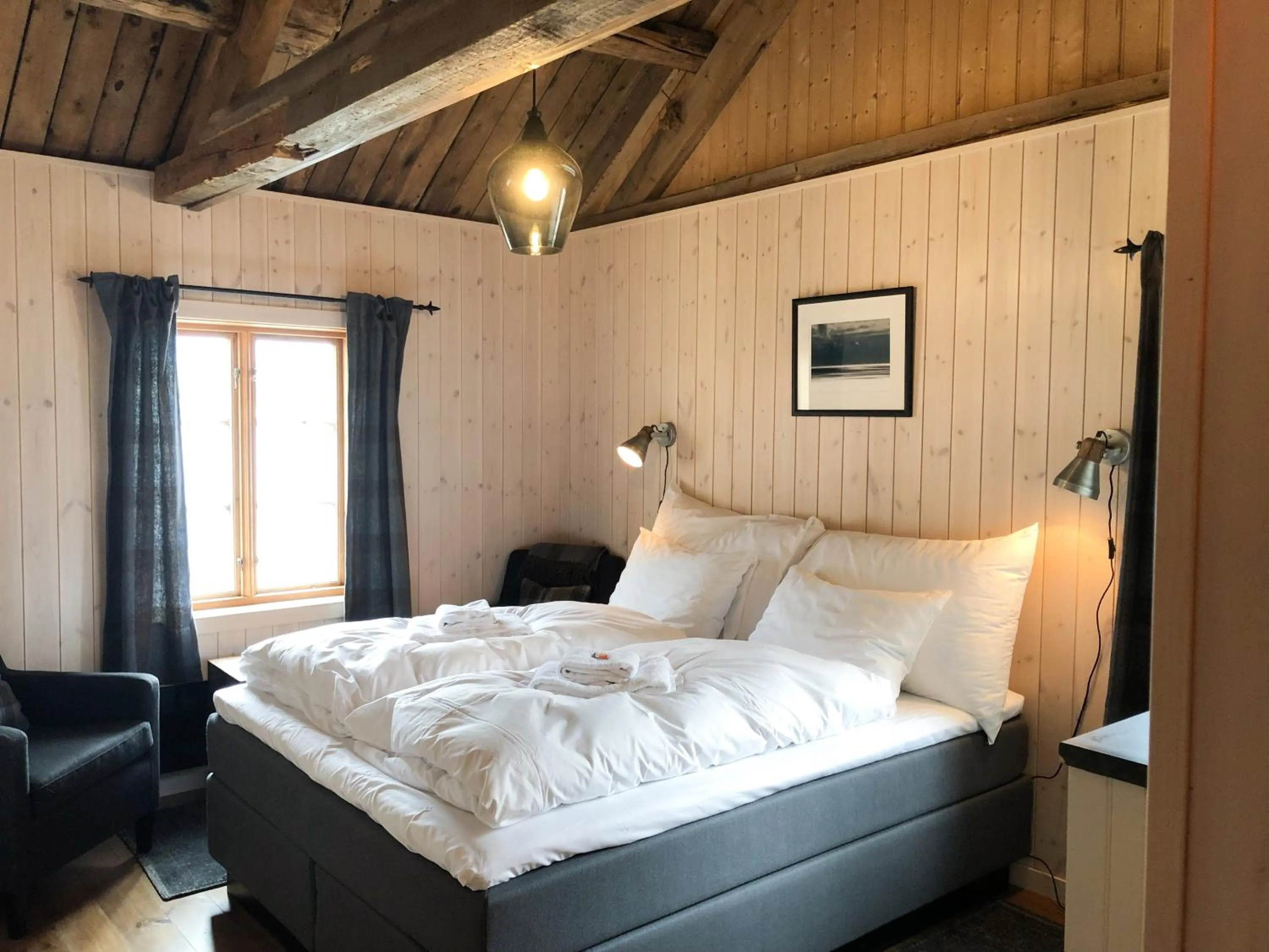 Bedroom, Bed in Reine Rorbuer - by Classic Norway Hotels