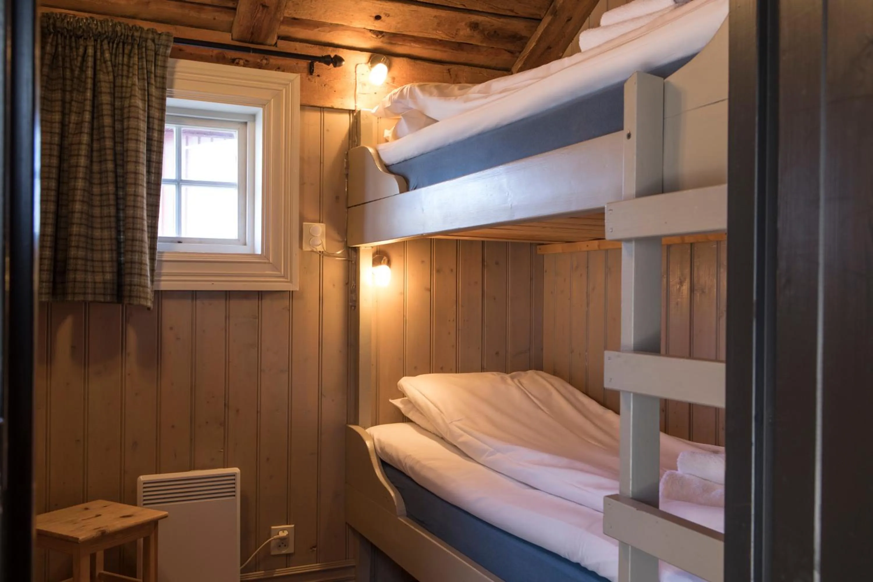 Bedroom, Bed in Reine Rorbuer - by Classic Norway Hotels