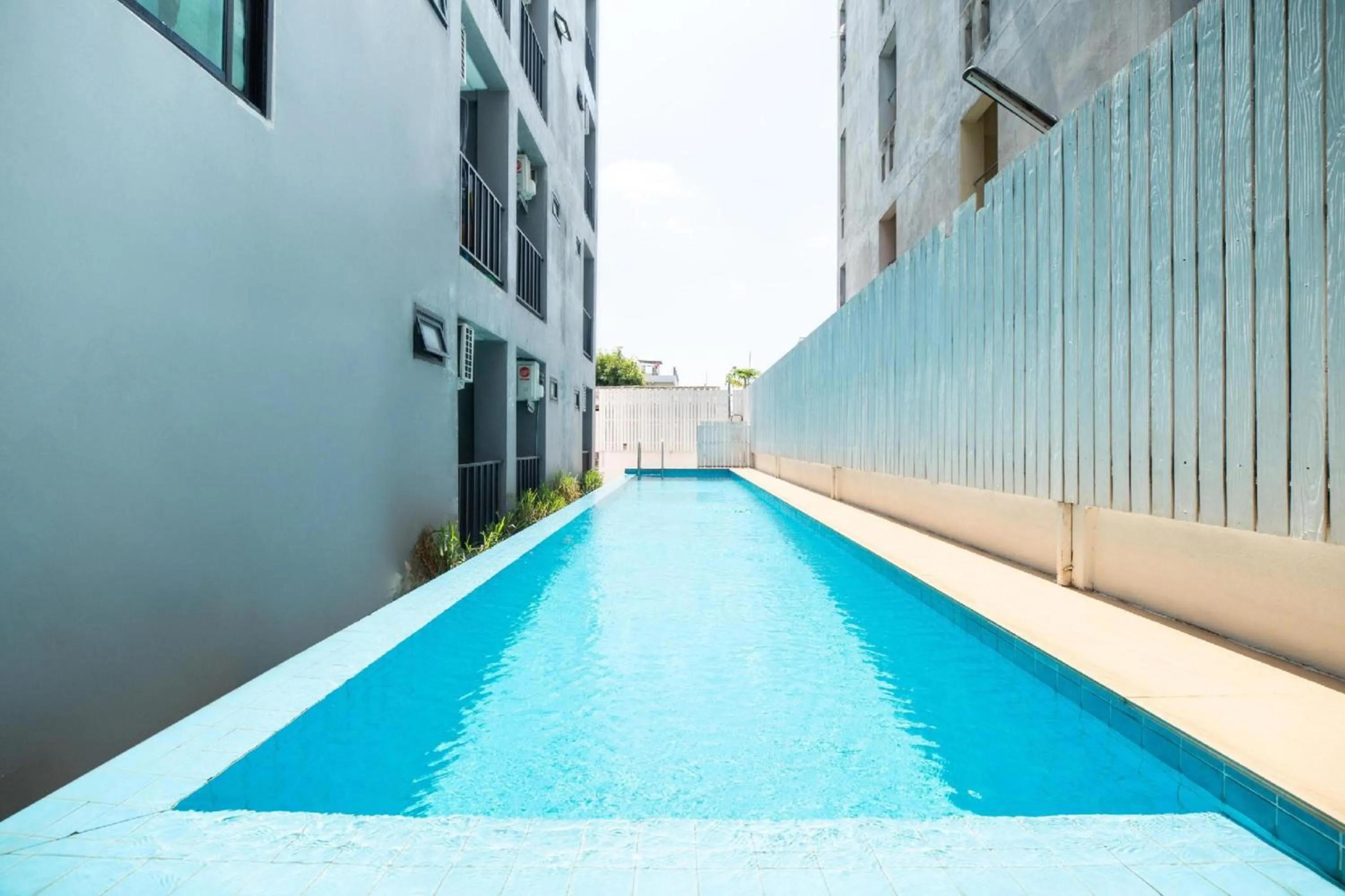 Swimming pool in Super OYO 427 Chill Apartment