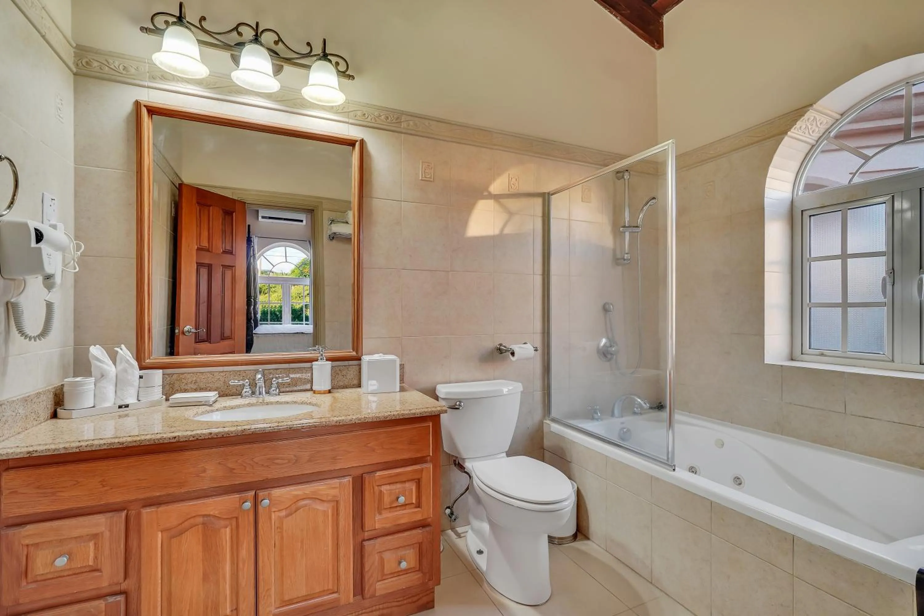 Shower in Mandela Court Suites Grenada