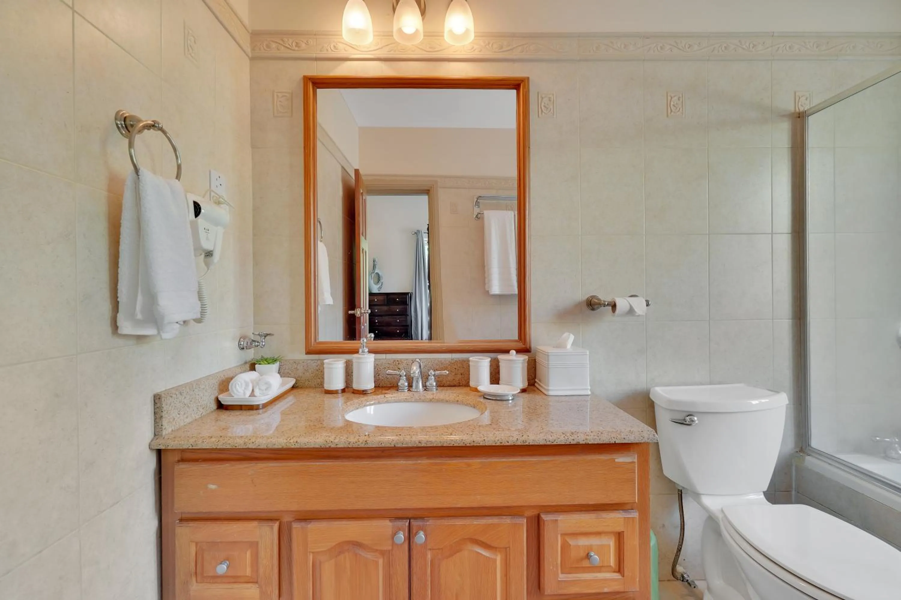 Shower in Mandela Court Suites Grenada