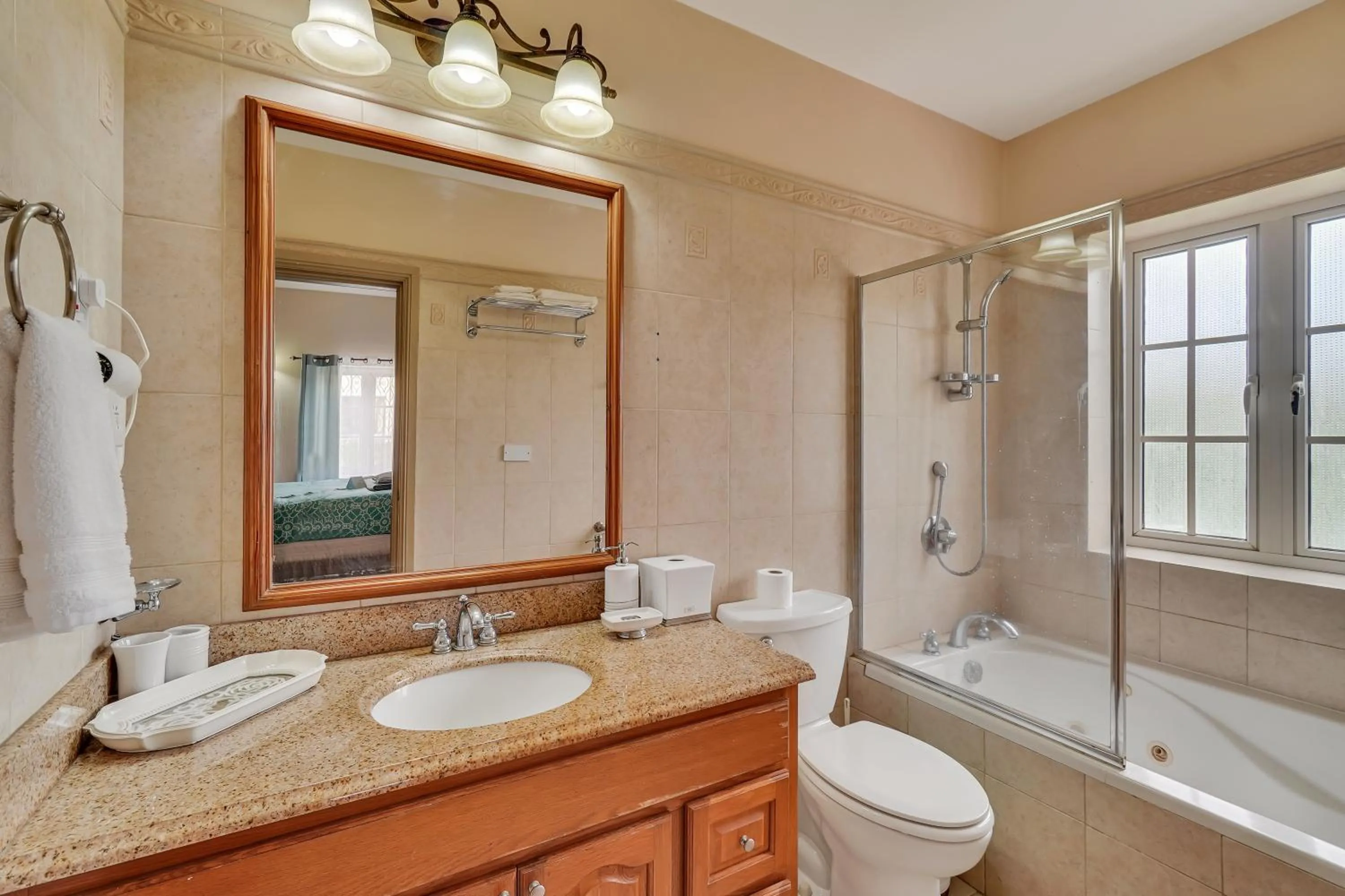 Shower in Mandela Court Suites Grenada