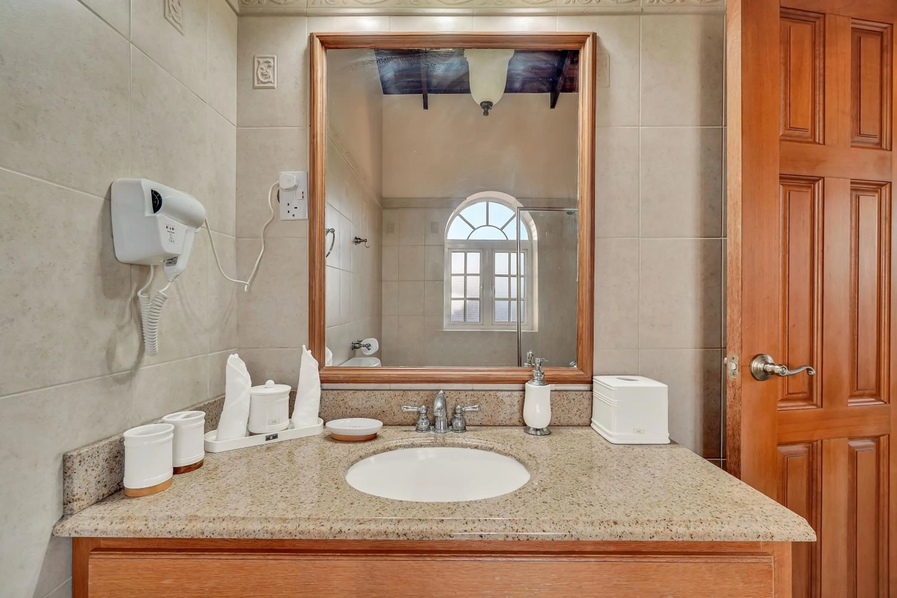 Shower in Mandela Court Suites Grenada